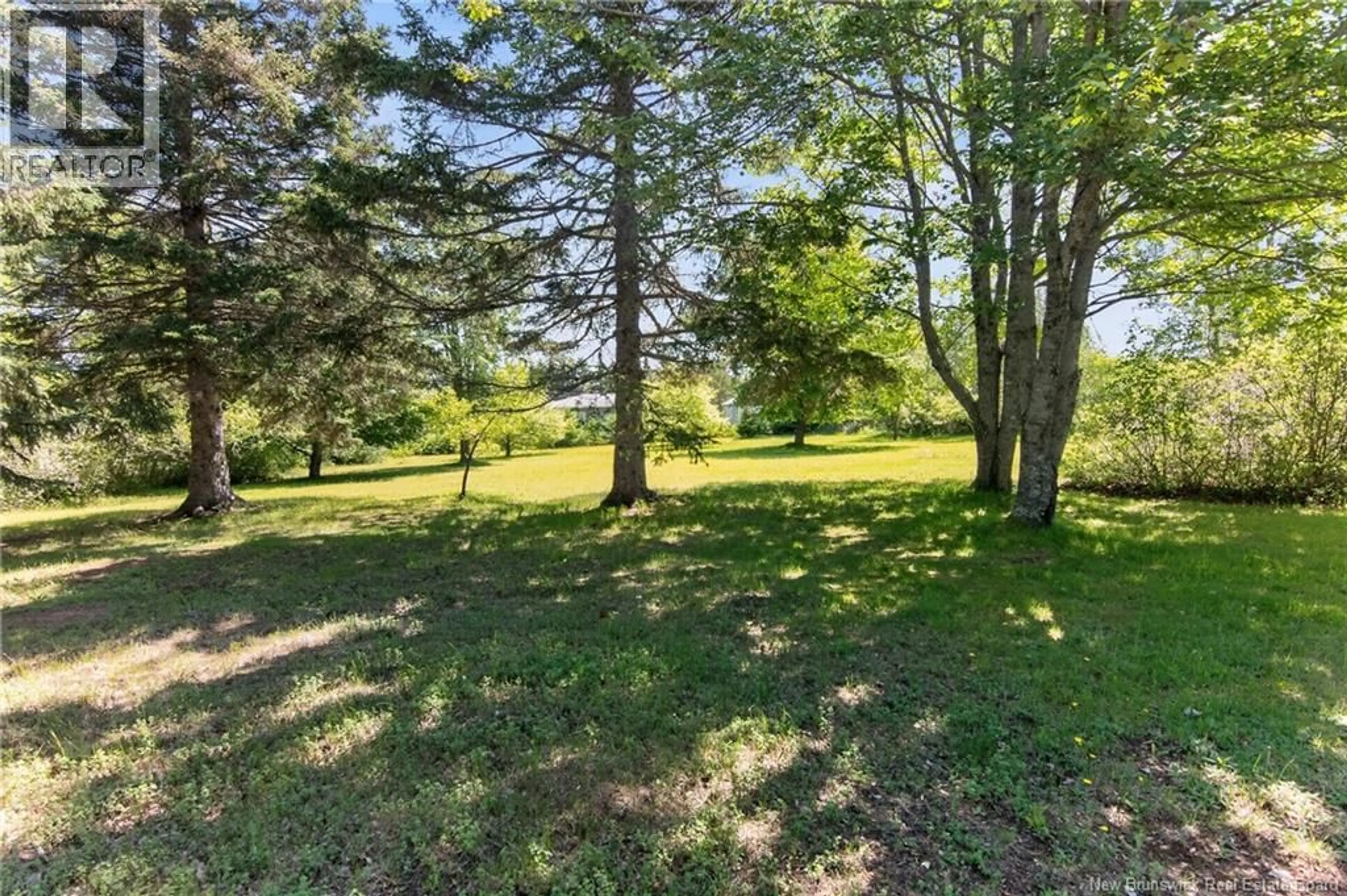 A pic from outside/outdoor area/front of a property/back of a property/a pic from drone, forest/trees view for 90 AQUILA CRESCENT, Grande-Digue New Brunswick E4R3T2