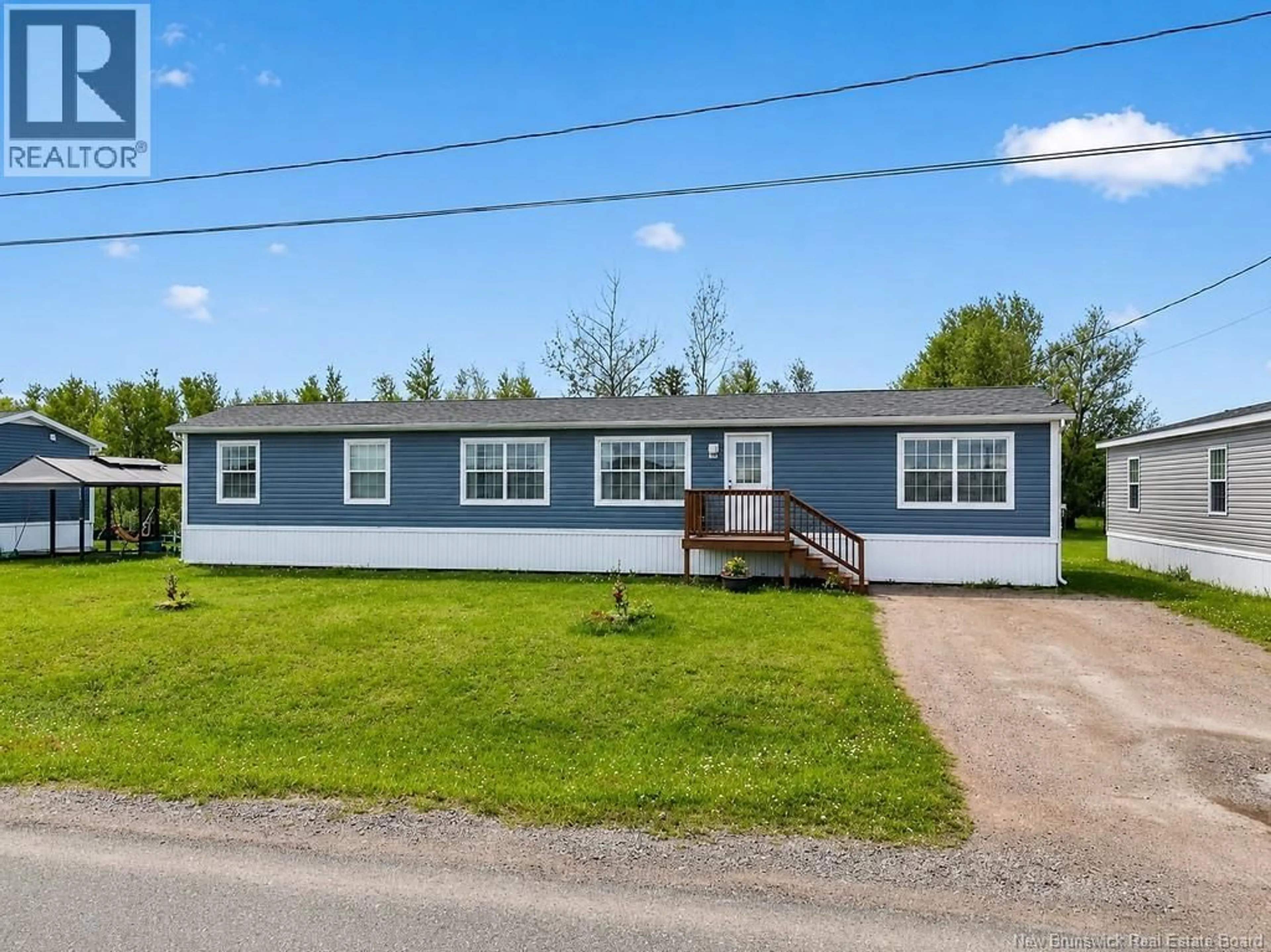 Home with vinyl exterior material, street for 19 RUE ANNA, Bas Cap Pele New Brunswick E4N0E3