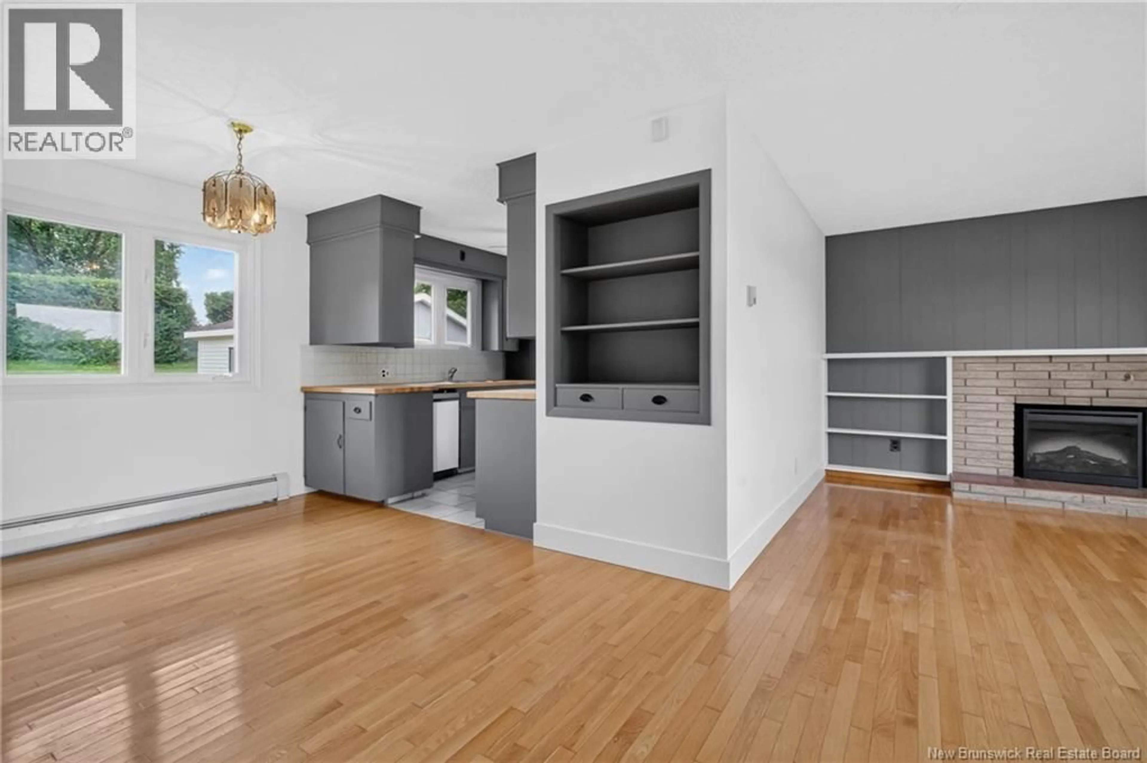Open concept kitchen, wood/laminate floor for 419 HOLDEN STREET, Oromocto New Brunswick E2V1G2