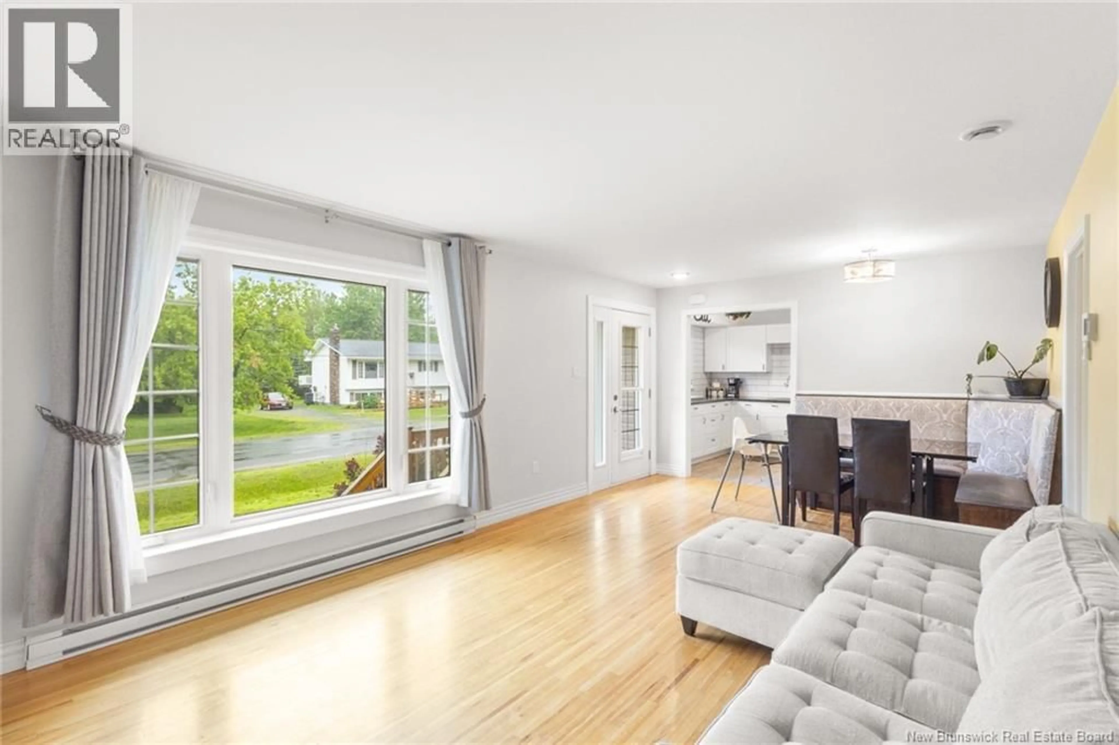 Living room with furniture, wood/laminate floor for 55 REICKER AVENUE, Beaver Dam New Brunswick E3B8B1
