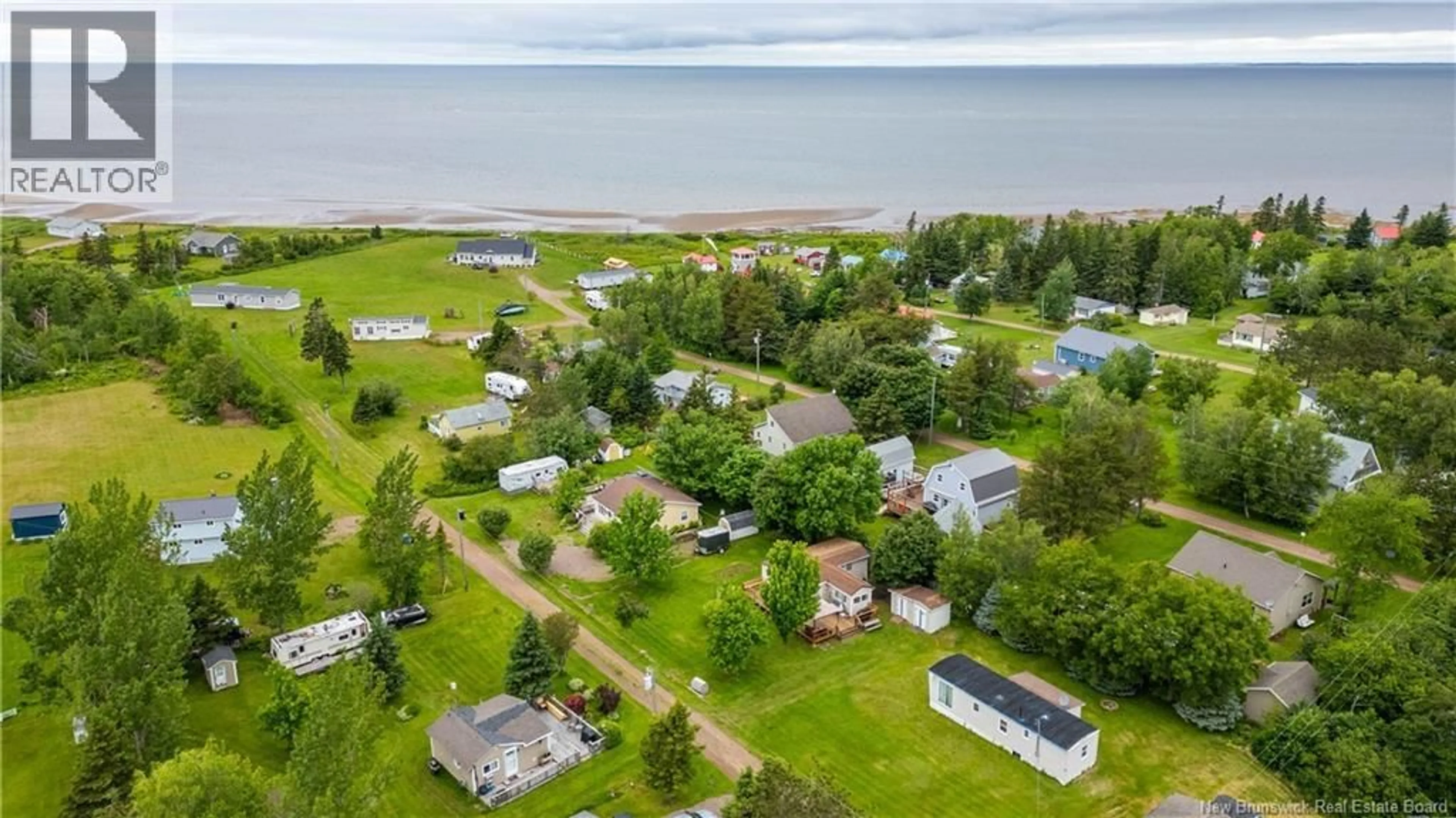 A pic from outside/outdoor area/front of a property/back of a property/a pic from drone, water/lake/river/ocean view for 25 WILD ROSE LANE, Bayfield New Brunswick E4M1E2