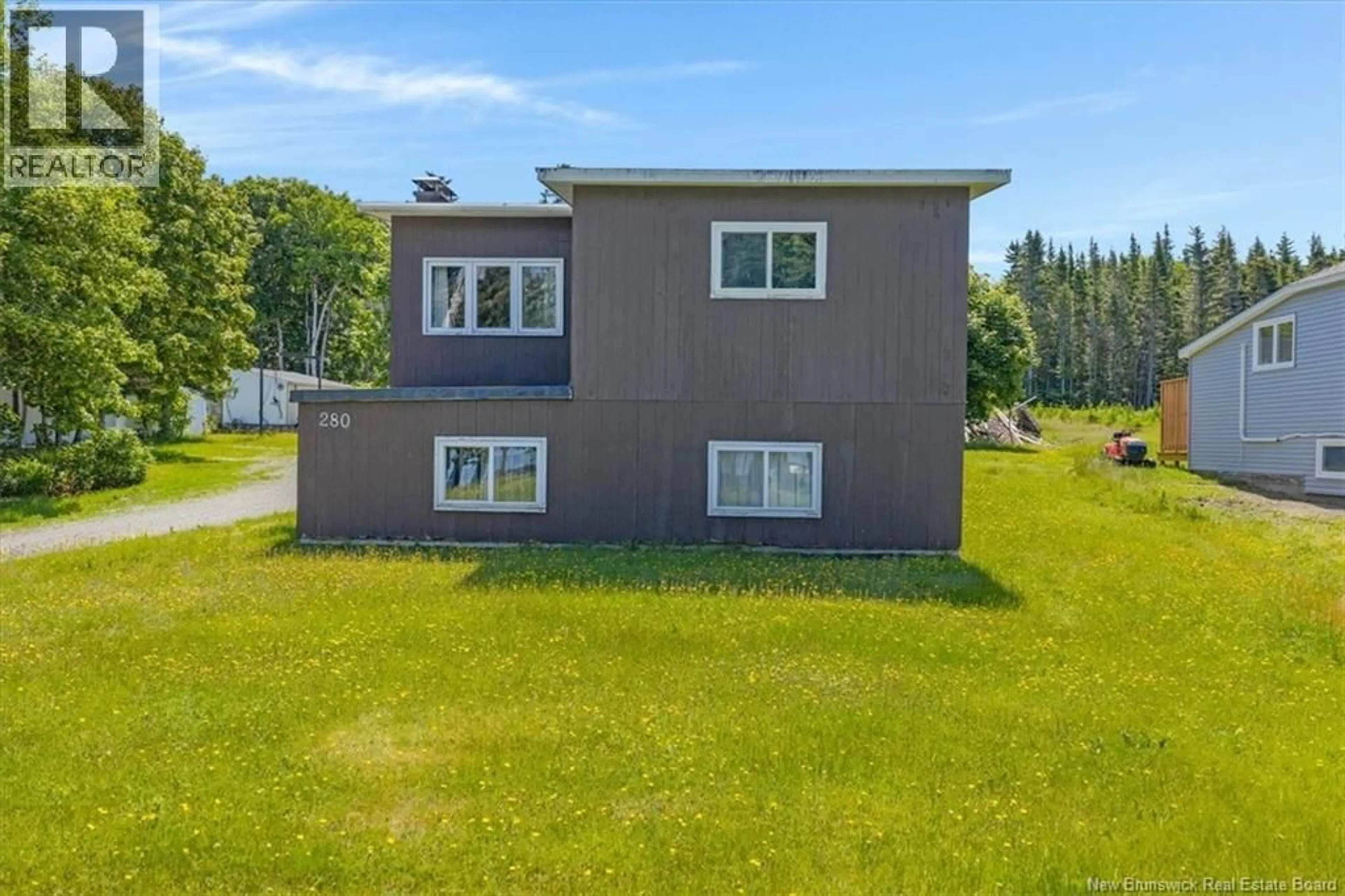 A pic from outside/outdoor area/front of a property/back of a property/a pic from drone, water/lake/river/ocean view for 280 ANTHONYS COVE ROAD, Saint John New Brunswick E2P1L1