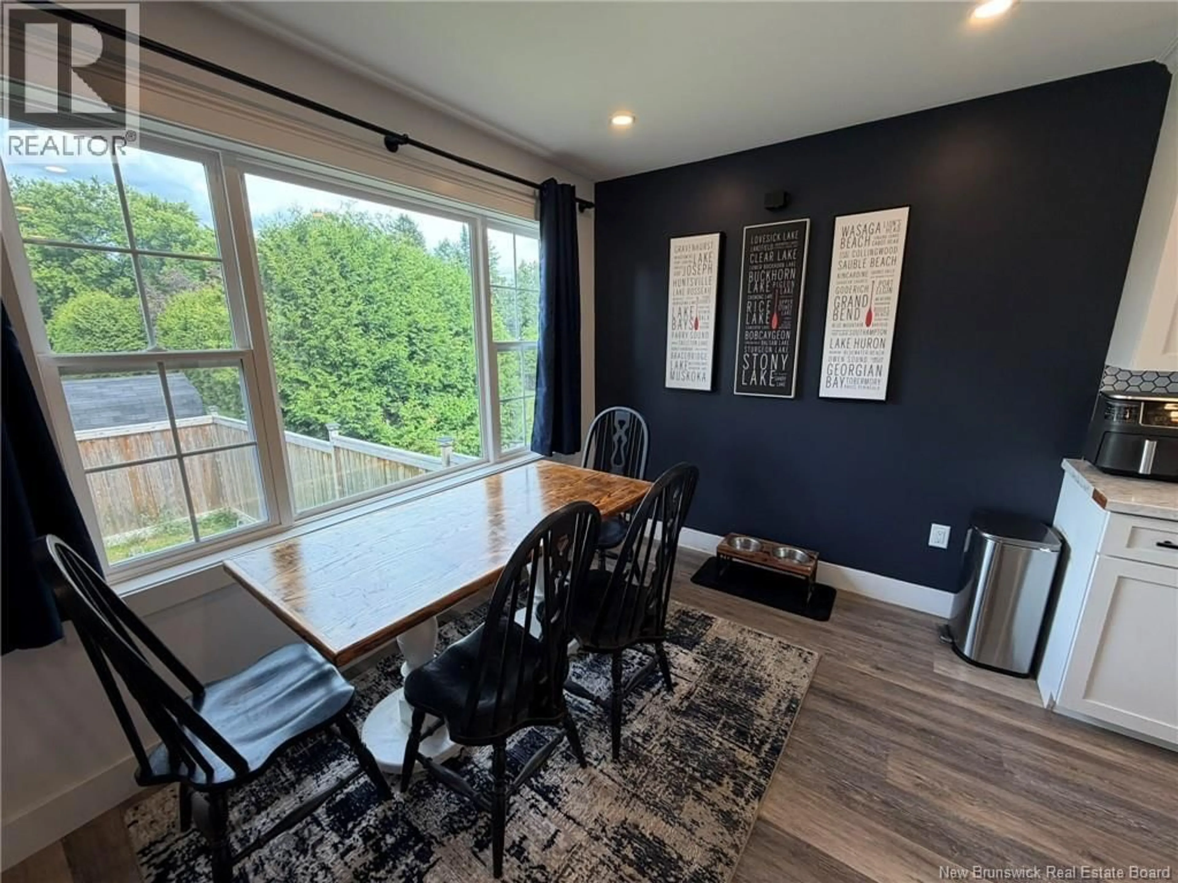 Dining room, wood/laminate floor for 104 SQUIRES STREET, Woodstock New Brunswick E7M2S5