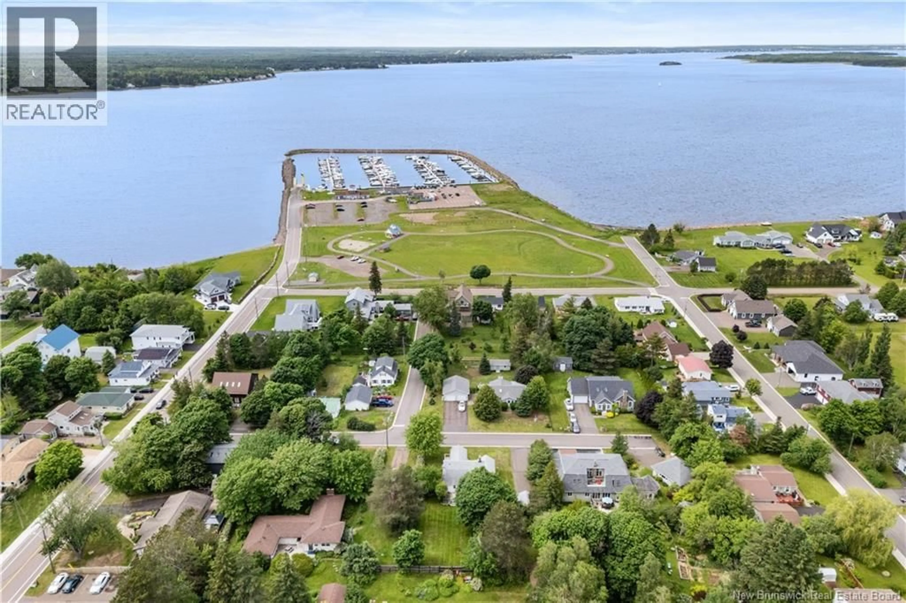 A pic from outside/outdoor area/front of a property/back of a property/a pic from drone, water/lake/river/ocean view for 253 ELIZABETH STREET, Shediac New Brunswick E4P1R4