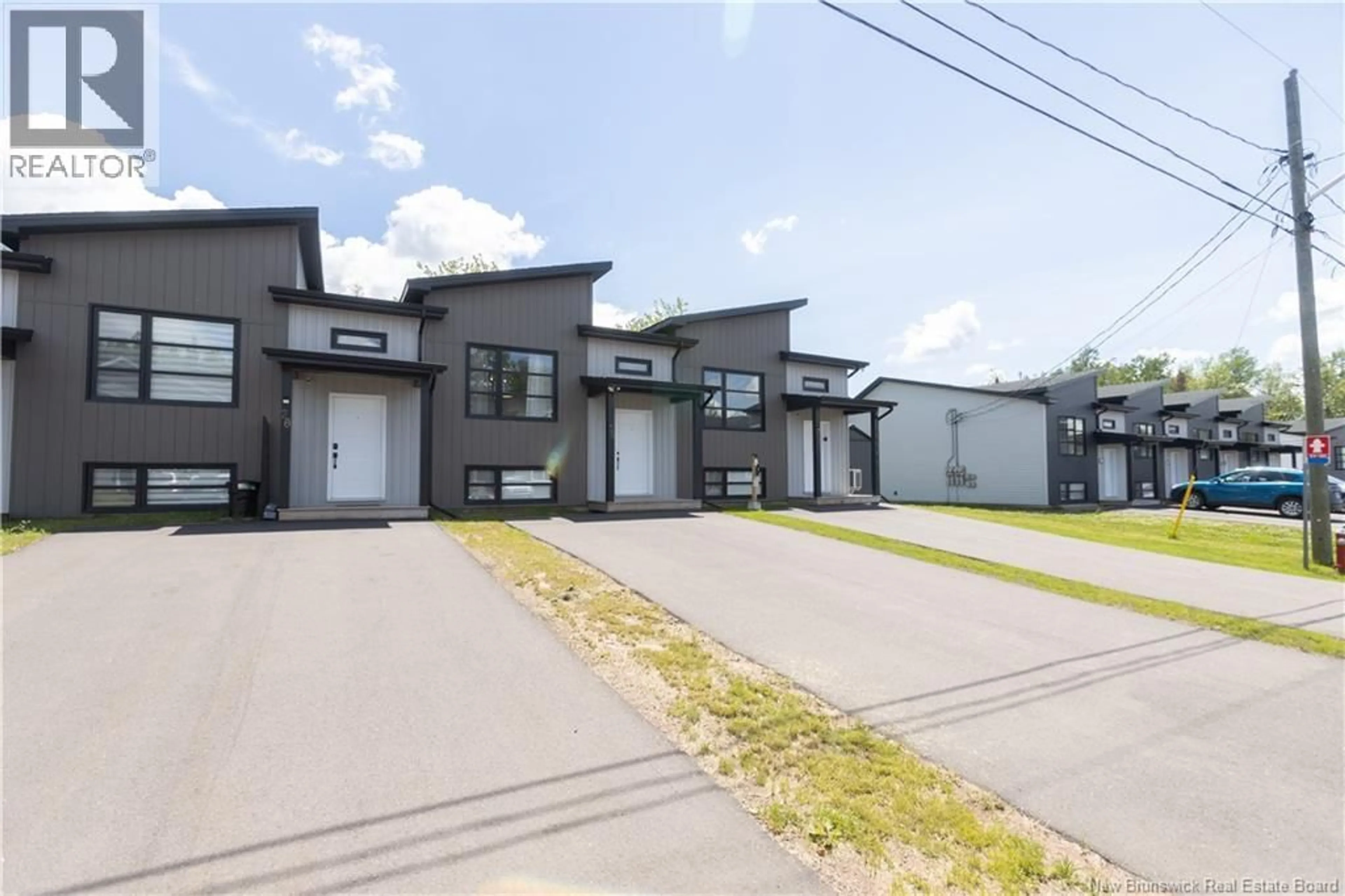 A pic from outside/outdoor area/front of a property/back of a property/a pic from drone, street for 30 BEAU DOMAINE COURT, Dieppe New Brunswick E1A9H5
