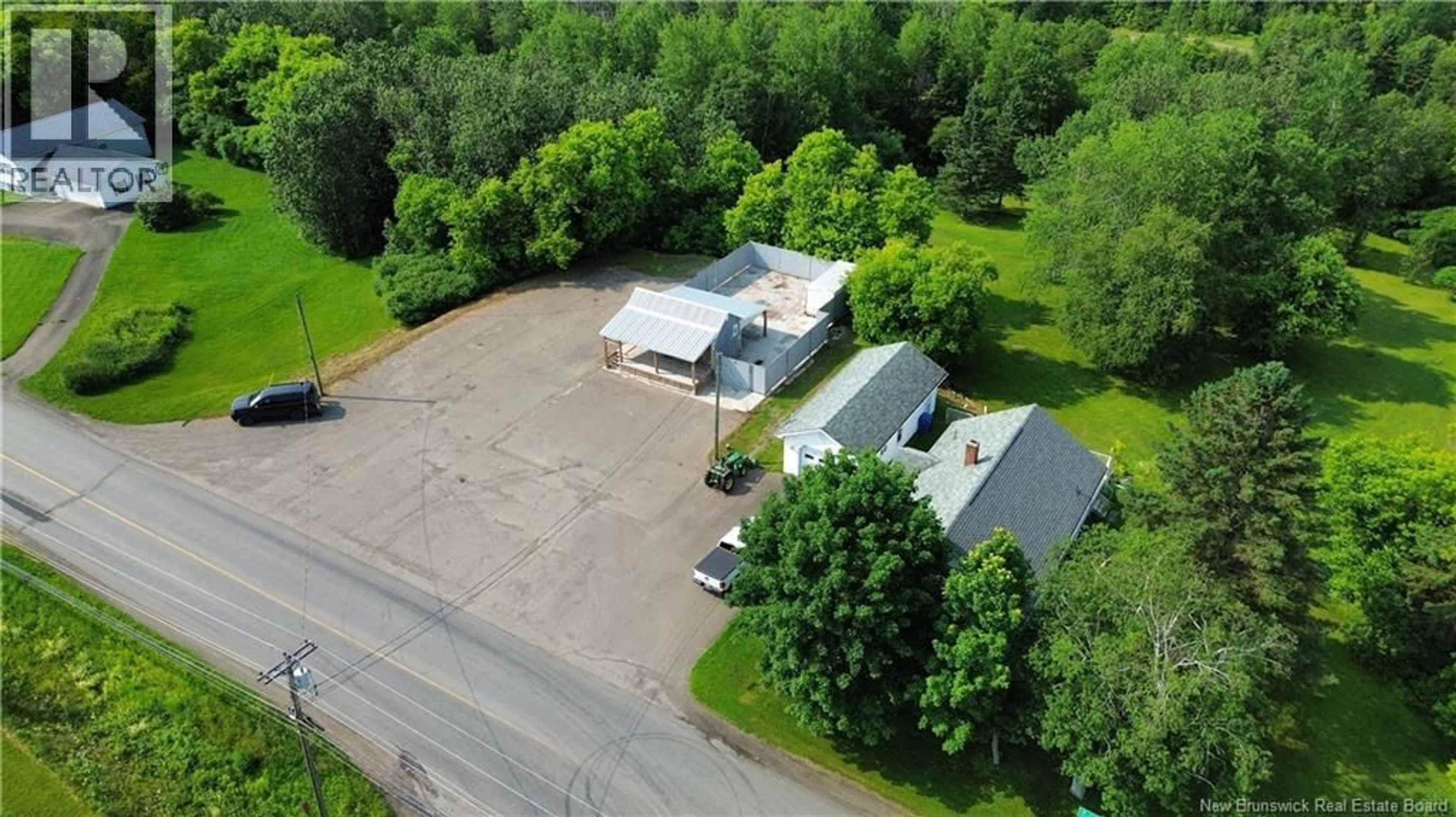 A pic from outside/outdoor area/front of a property/back of a property/a pic from drone, building for 9799 ROUTE 105, Beechwood New Brunswick E7J1W2