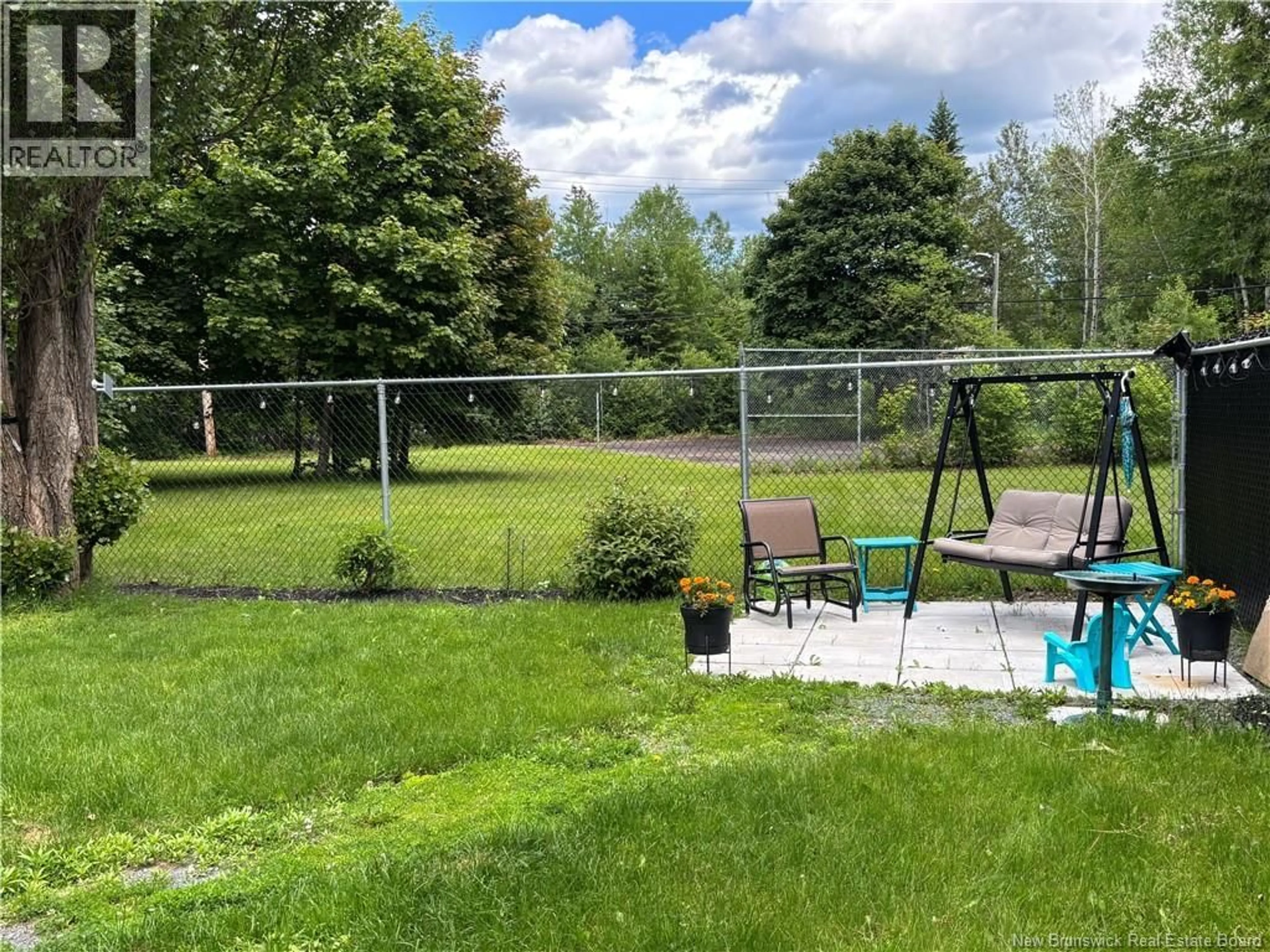 A pic from outside/outdoor area/front of a property/back of a property/a pic from drone, forest/trees view for 707 PARKWOOD STREET, Bathurst New Brunswick E2A4C2