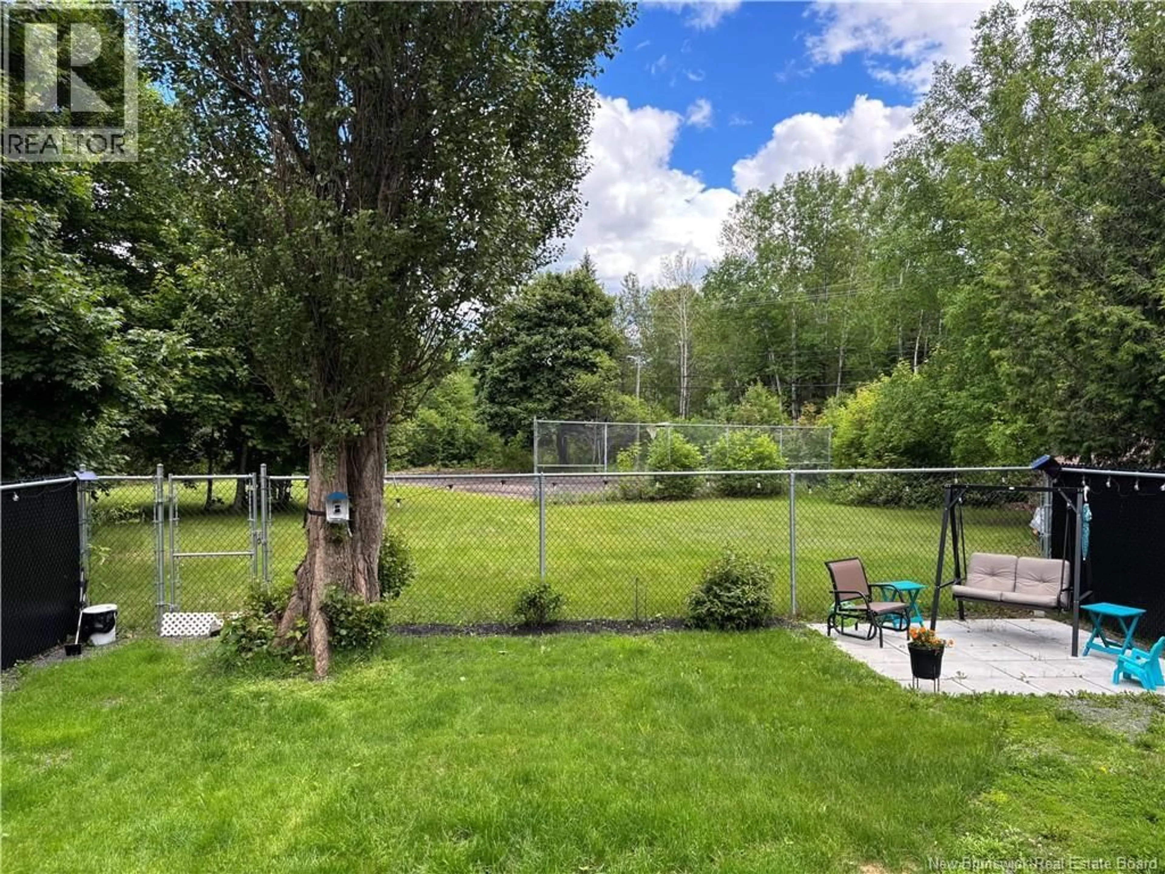 A pic from outside/outdoor area/front of a property/back of a property/a pic from drone, forest/trees view for 707 PARKWOOD STREET, Bathurst New Brunswick E2A4C2