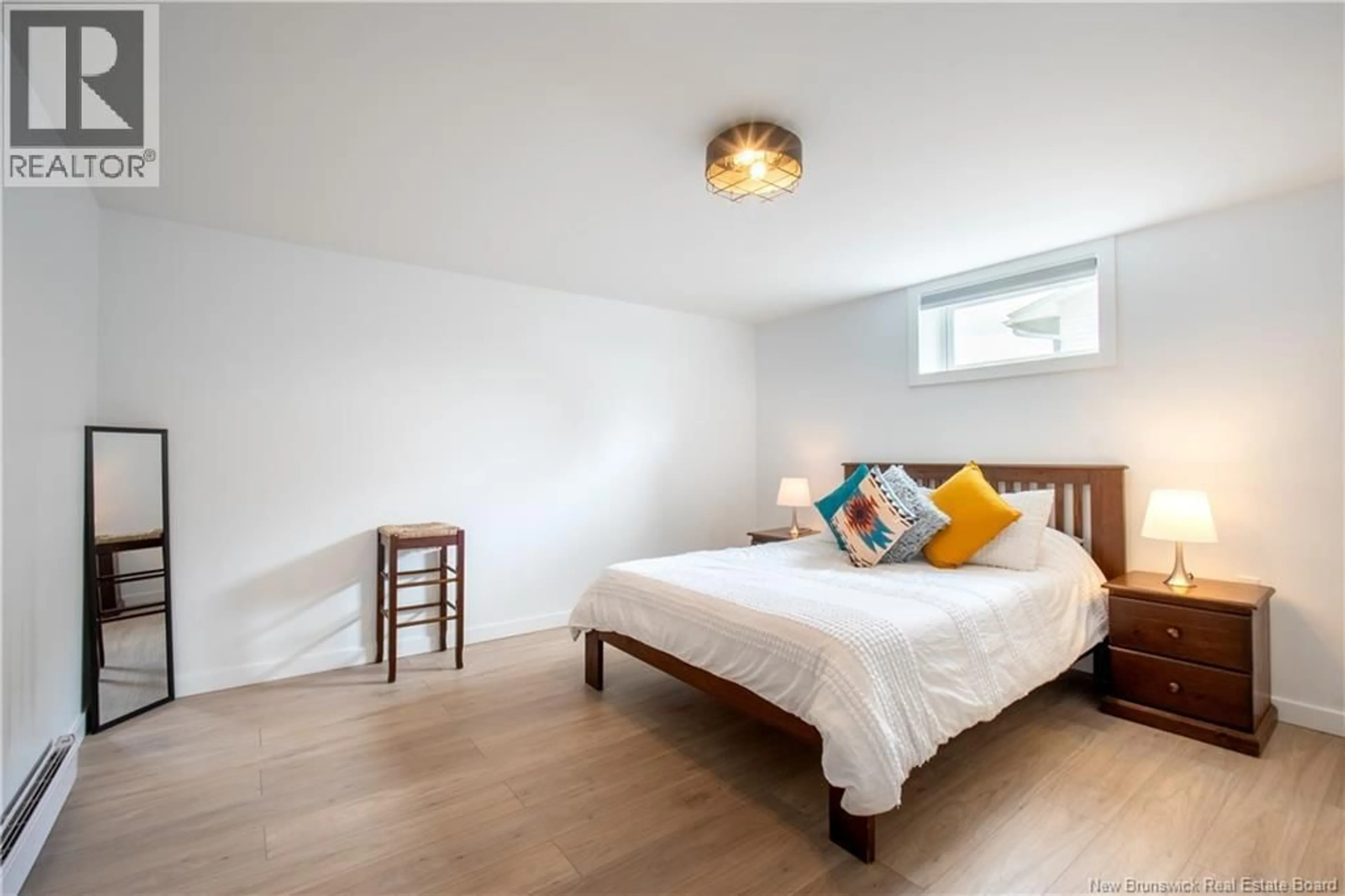 Bedroom with bed, wood/laminate floor for 24 BOLTON STREET, Moncton New Brunswick E1E4H2