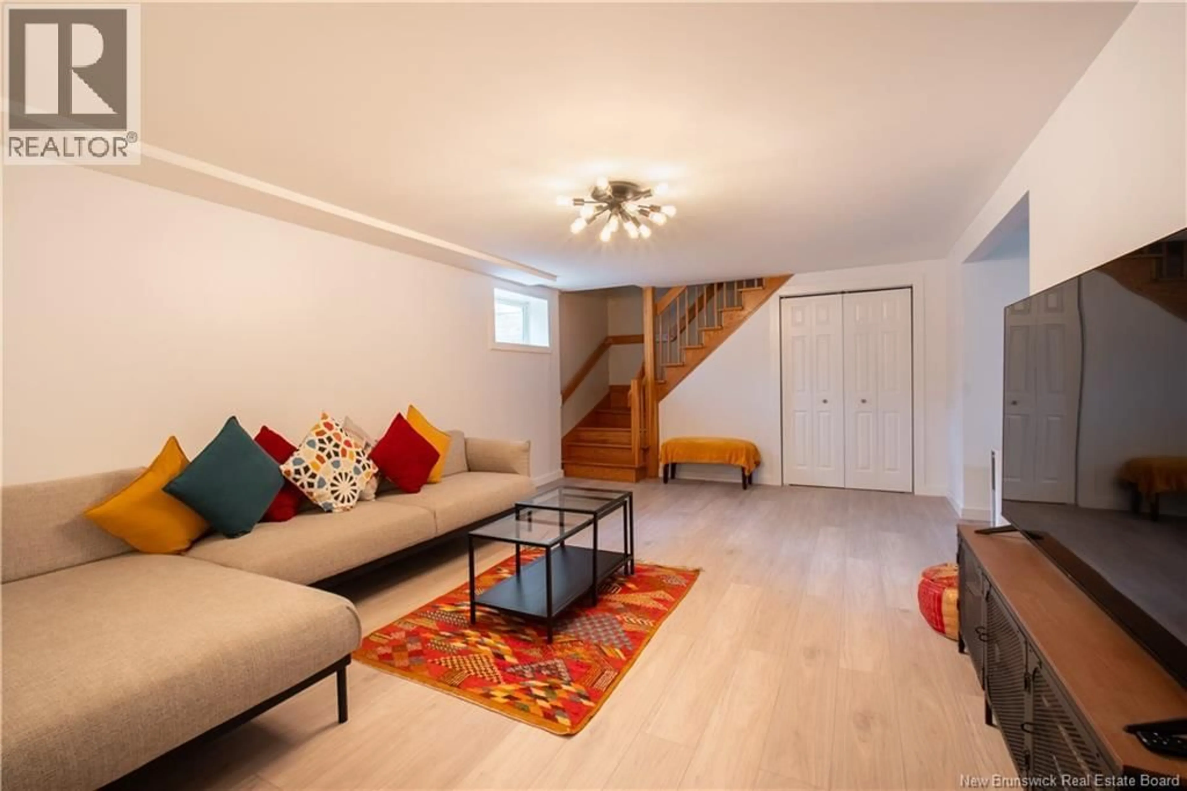 Living room with furniture, unknown for 24 BOLTON STREET, Moncton New Brunswick E1E4H2