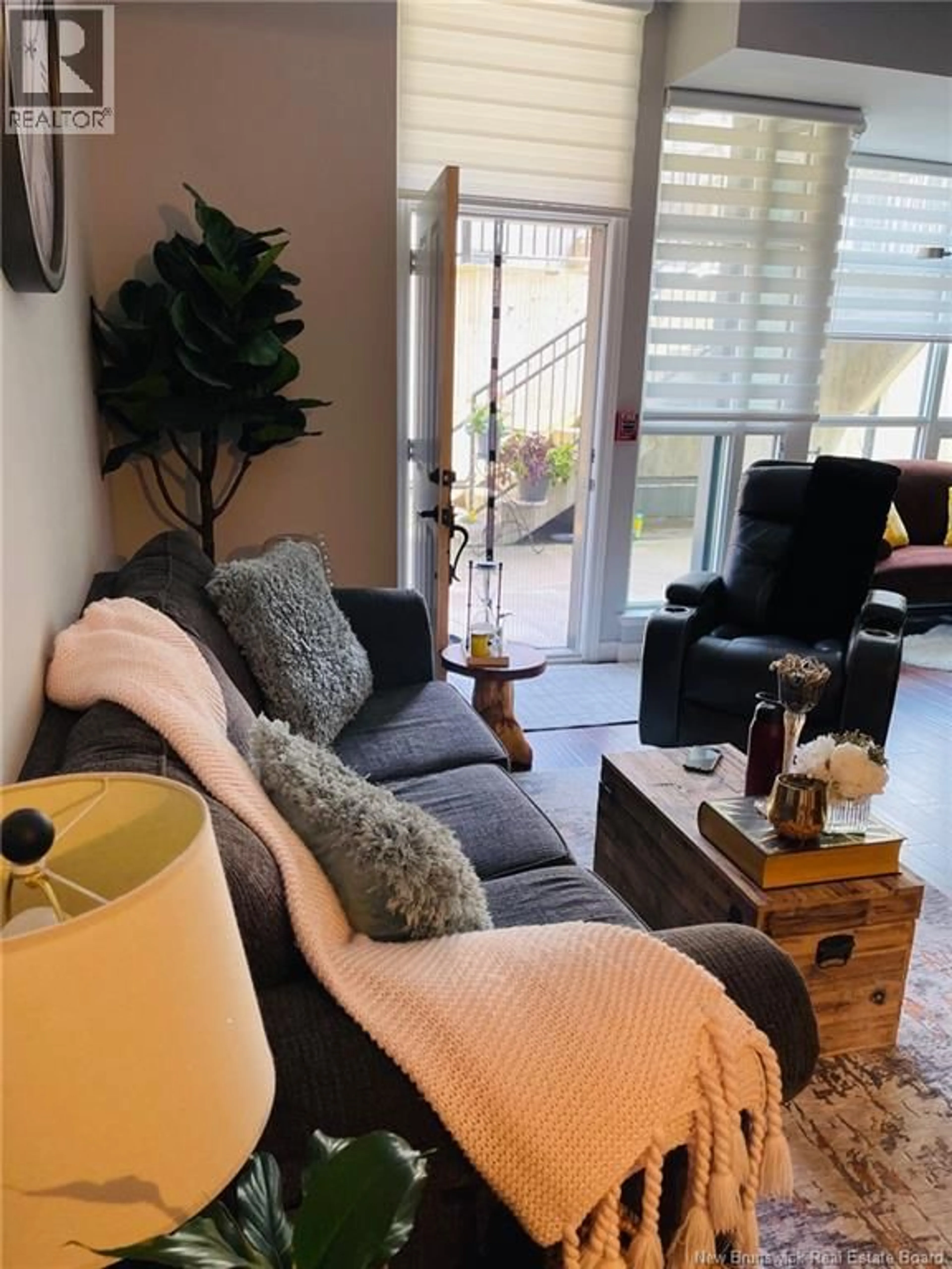 Living room with furniture, unknown for 117 - 243 PRINCE WILLIAM STREET, Saint John New Brunswick E2L0C6