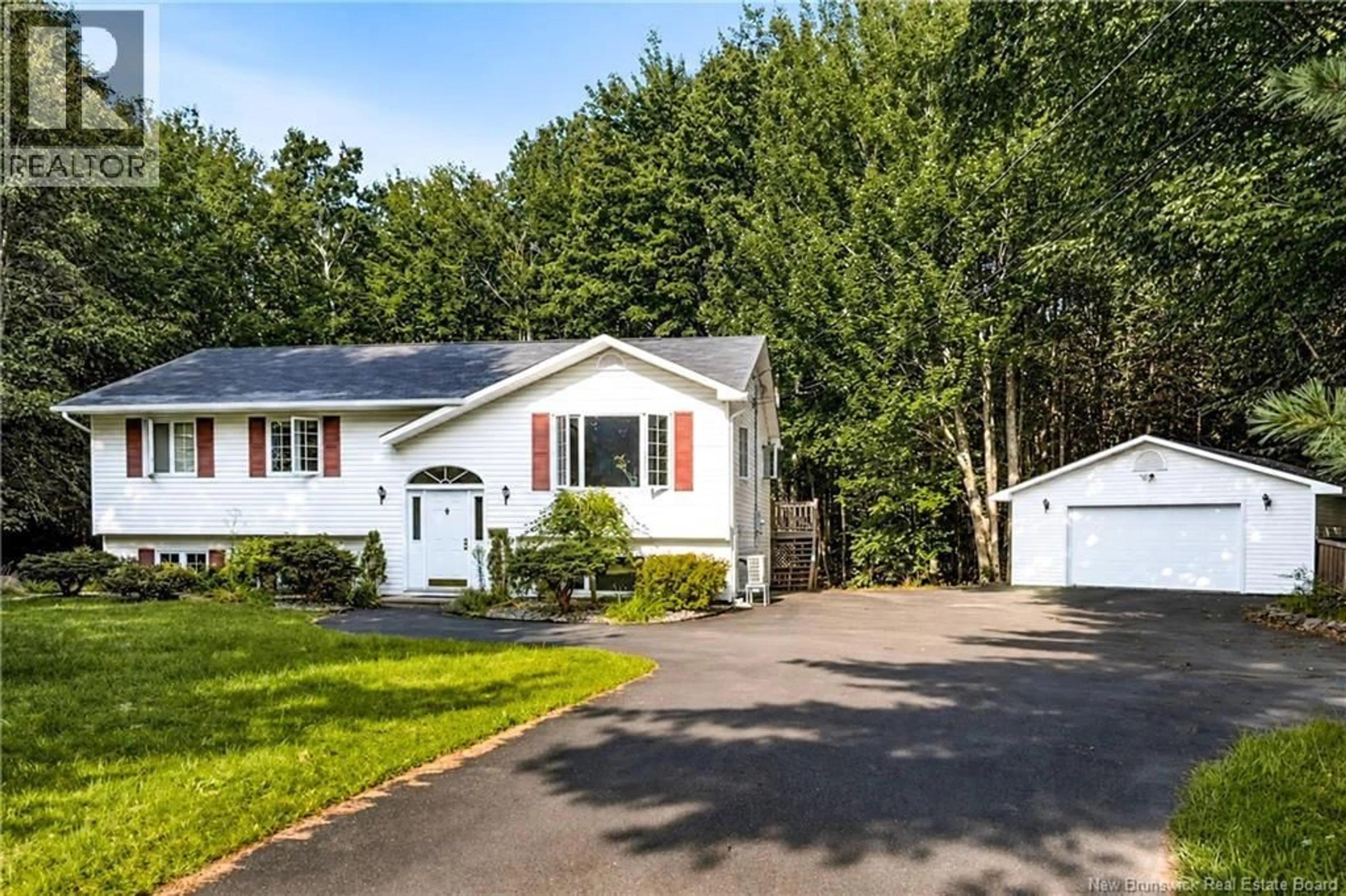 Home with vinyl exterior material, street for 100 ROCKWOOD WAY, Richibucto Road New Brunswick E3A6X4