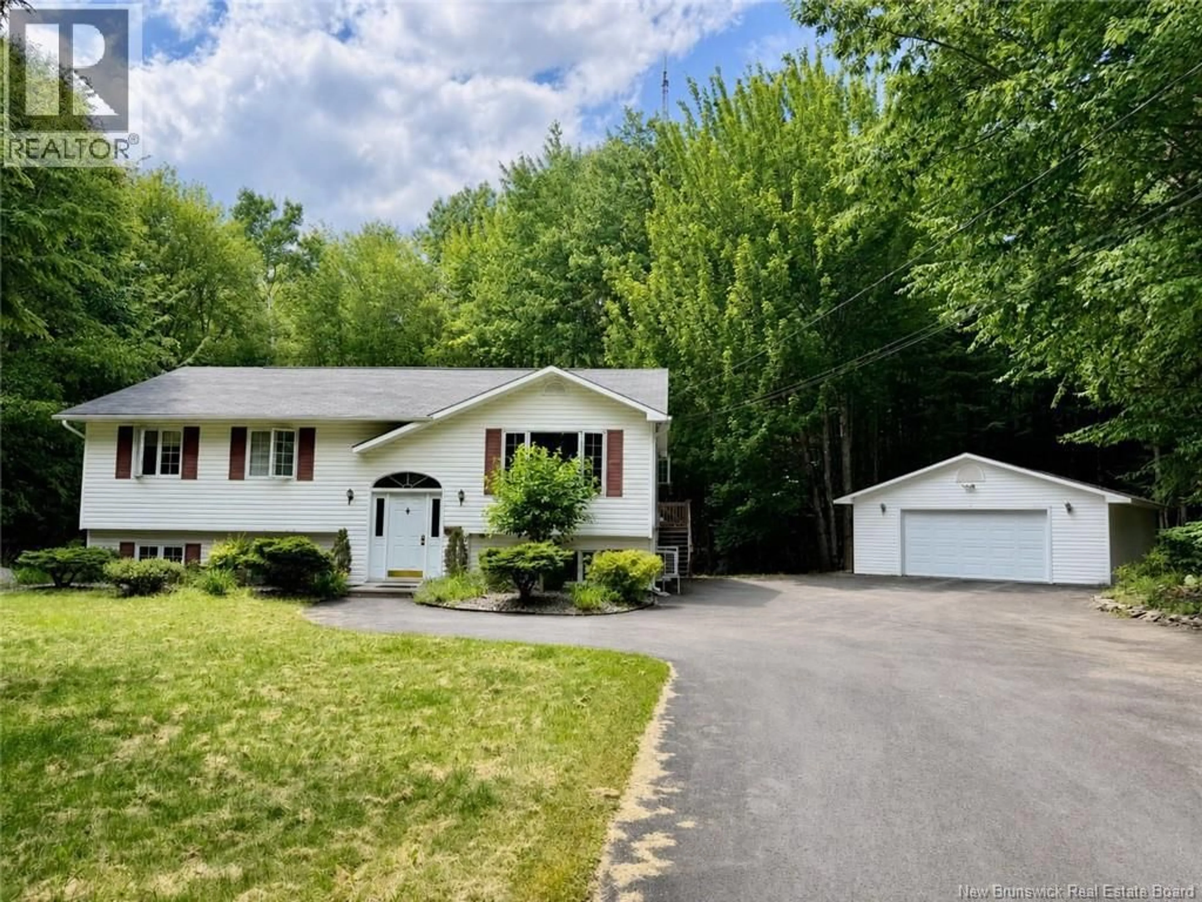 Home with vinyl exterior material, street for 100 ROCKWOOD WAY, Richibucto Road New Brunswick E3A6X4
