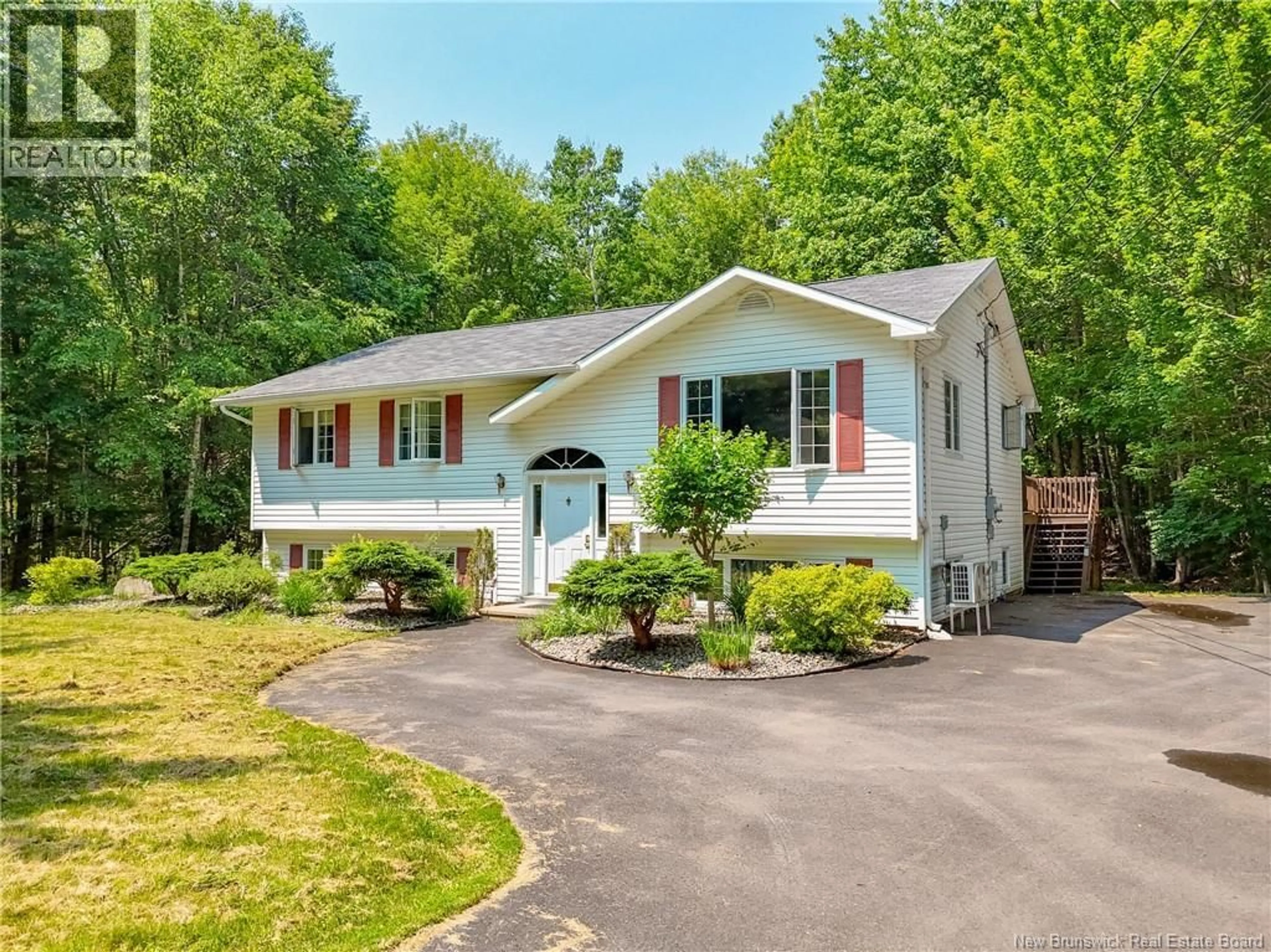 Home with vinyl exterior material, street for 100 ROCKWOOD WAY, Richibucto Road New Brunswick E3A6X4