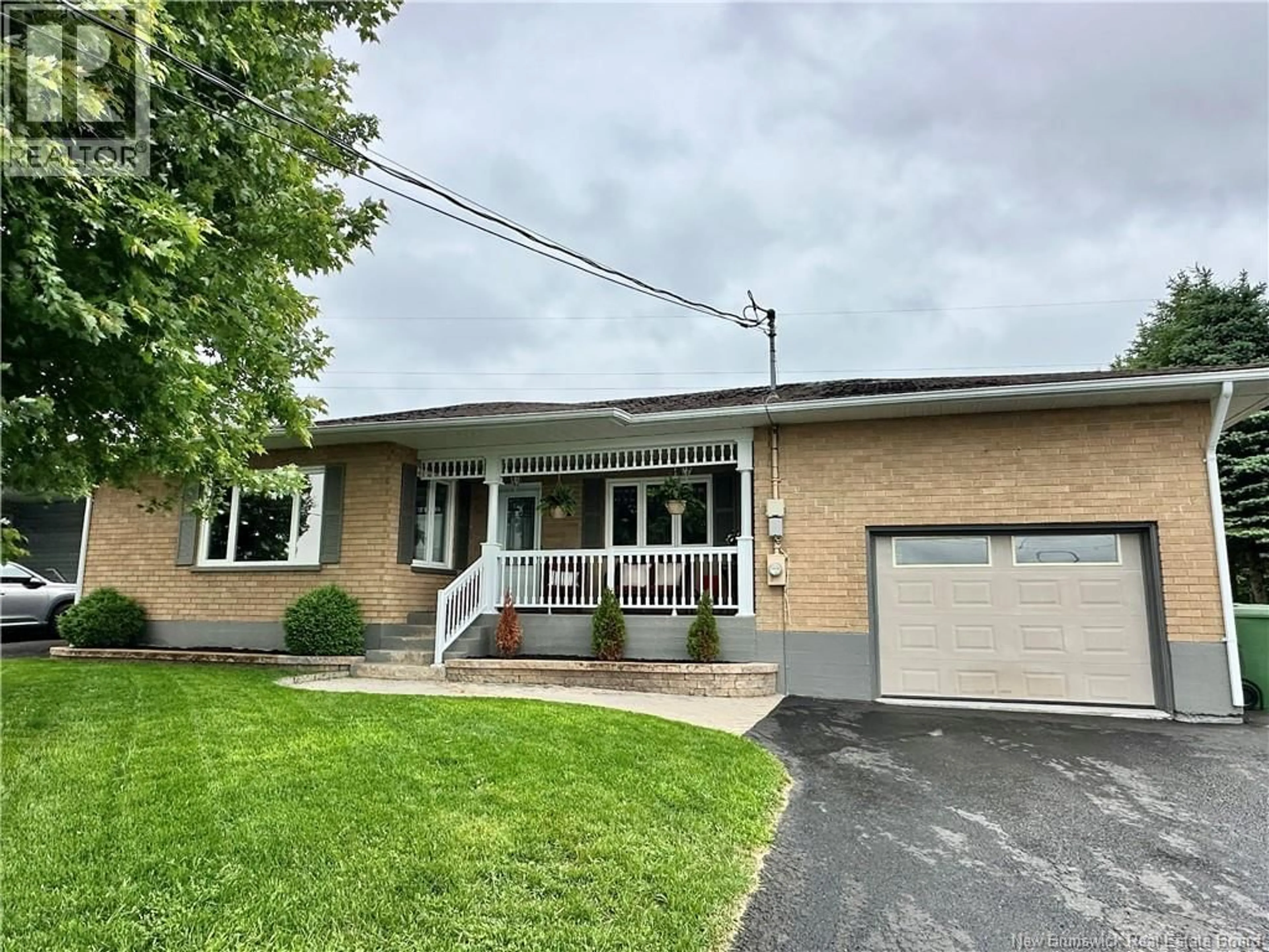 Home with brick exterior material, street for 196 GODBOUT STREET, Grand-Sault/Grand Falls New Brunswick E3Y1C2