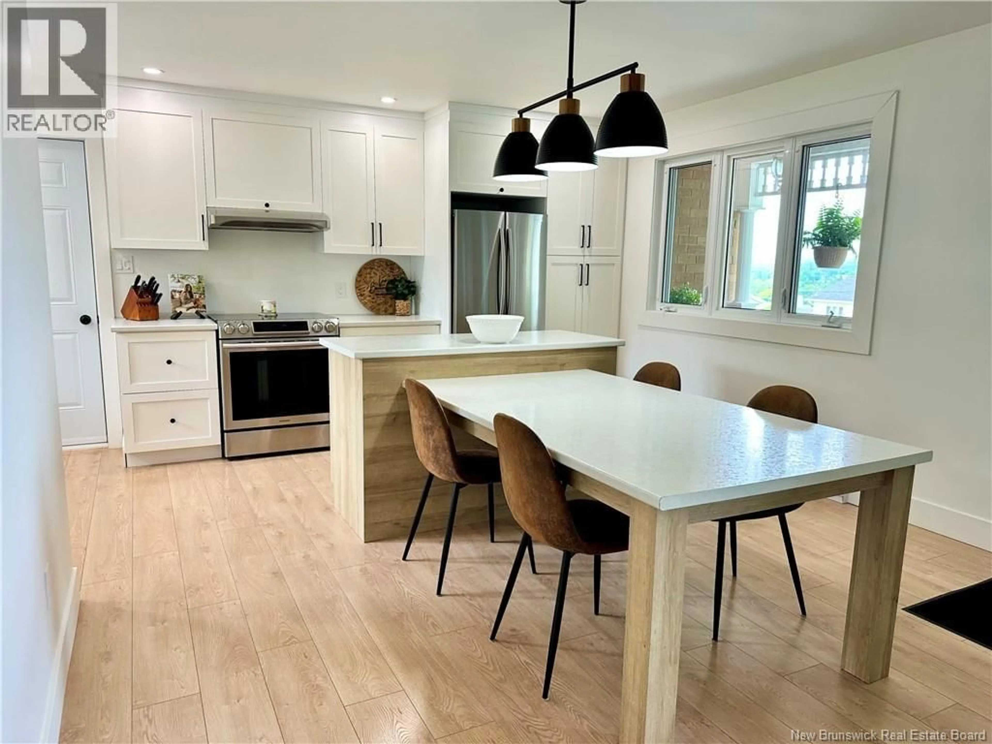 Open concept kitchen, wood/laminate floor for 196 GODBOUT STREET, Grand-Sault/Grand Falls New Brunswick E3Y1C2