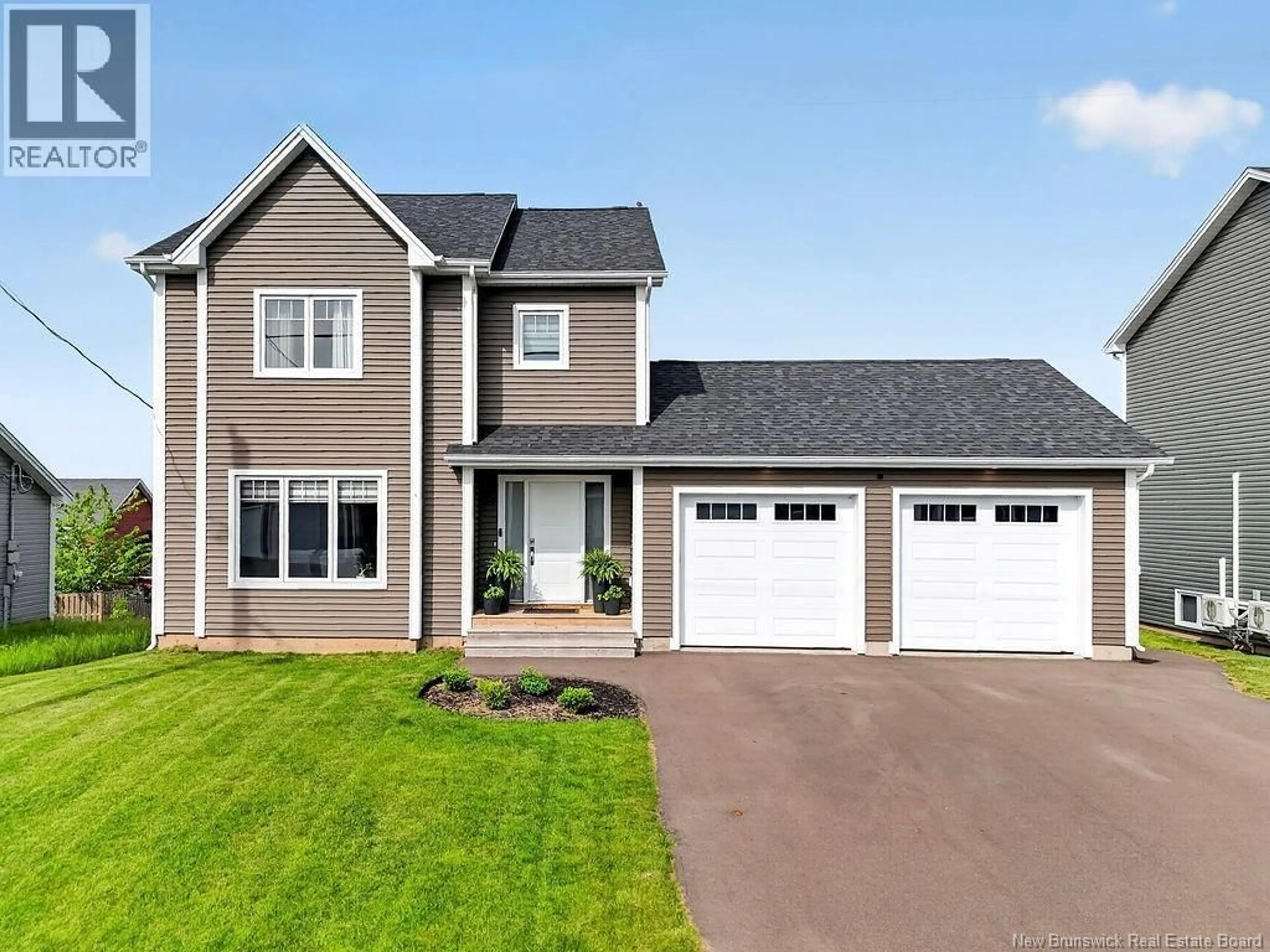 Home with vinyl exterior material, street for 34 AMITY STREET, Moncton New Brunswick E1G0S3