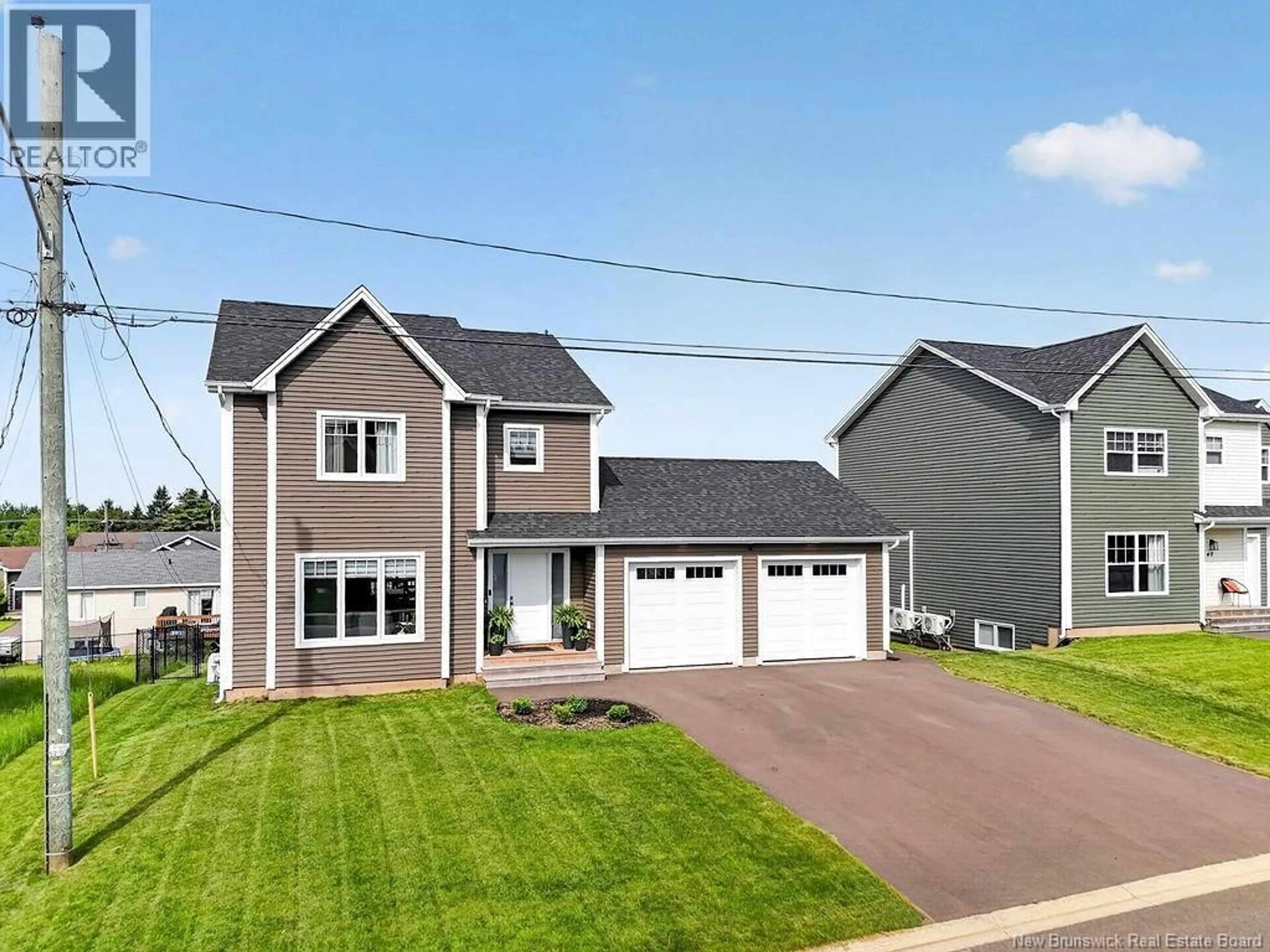 Home with vinyl exterior material, street for 34 AMITY STREET, Moncton New Brunswick E1G0S3