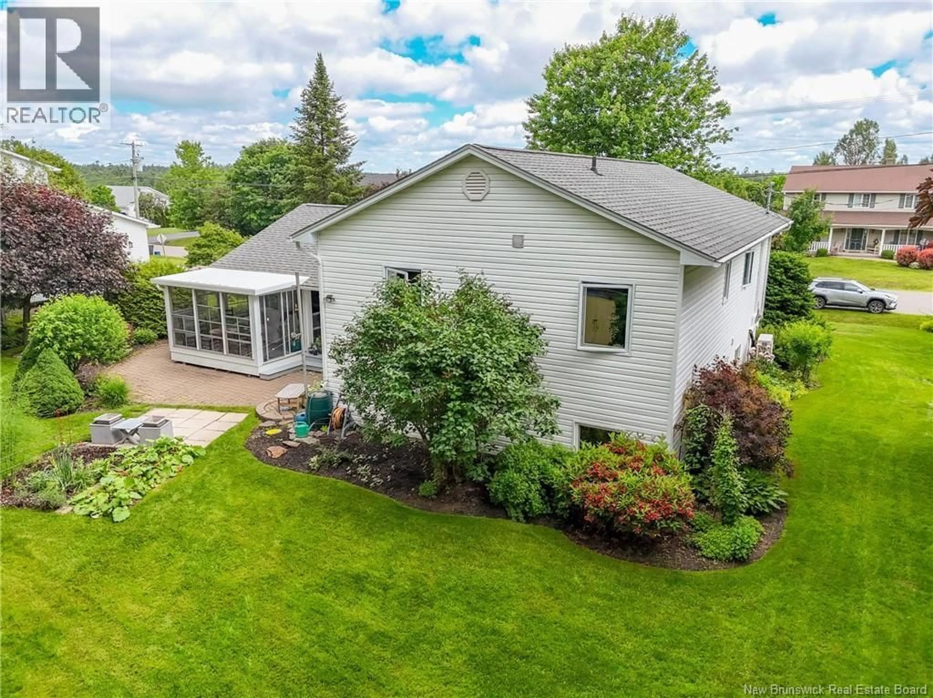 A pic from outside/outdoor area/front of a property/back of a property/a pic from drone, street for 114 ATKINSON LANE, New Maryland New Brunswick E3C1J8