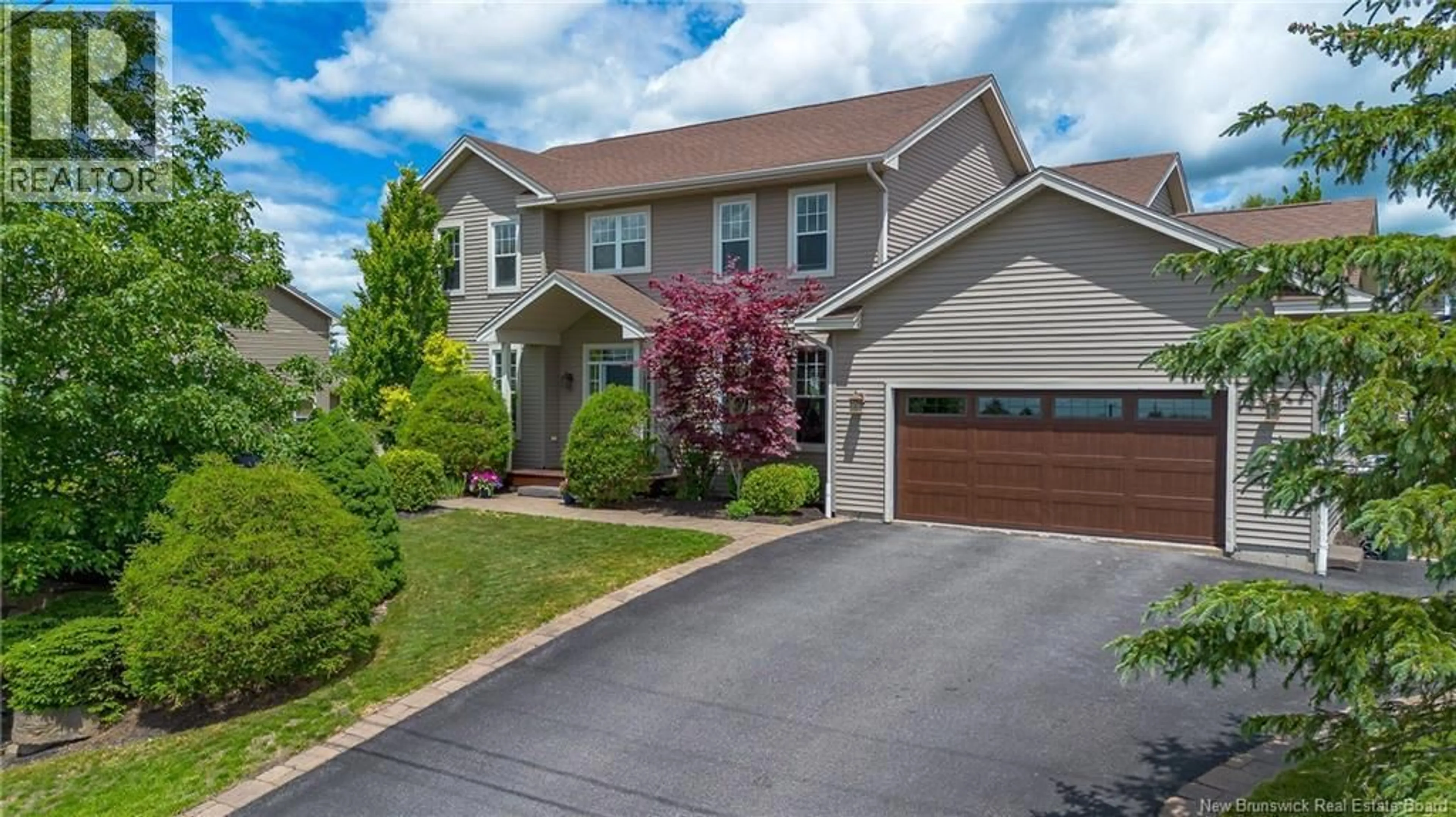 Home with vinyl exterior material, street for 19 GRASMERE AVENUE, Quispamsis New Brunswick E2E0B5