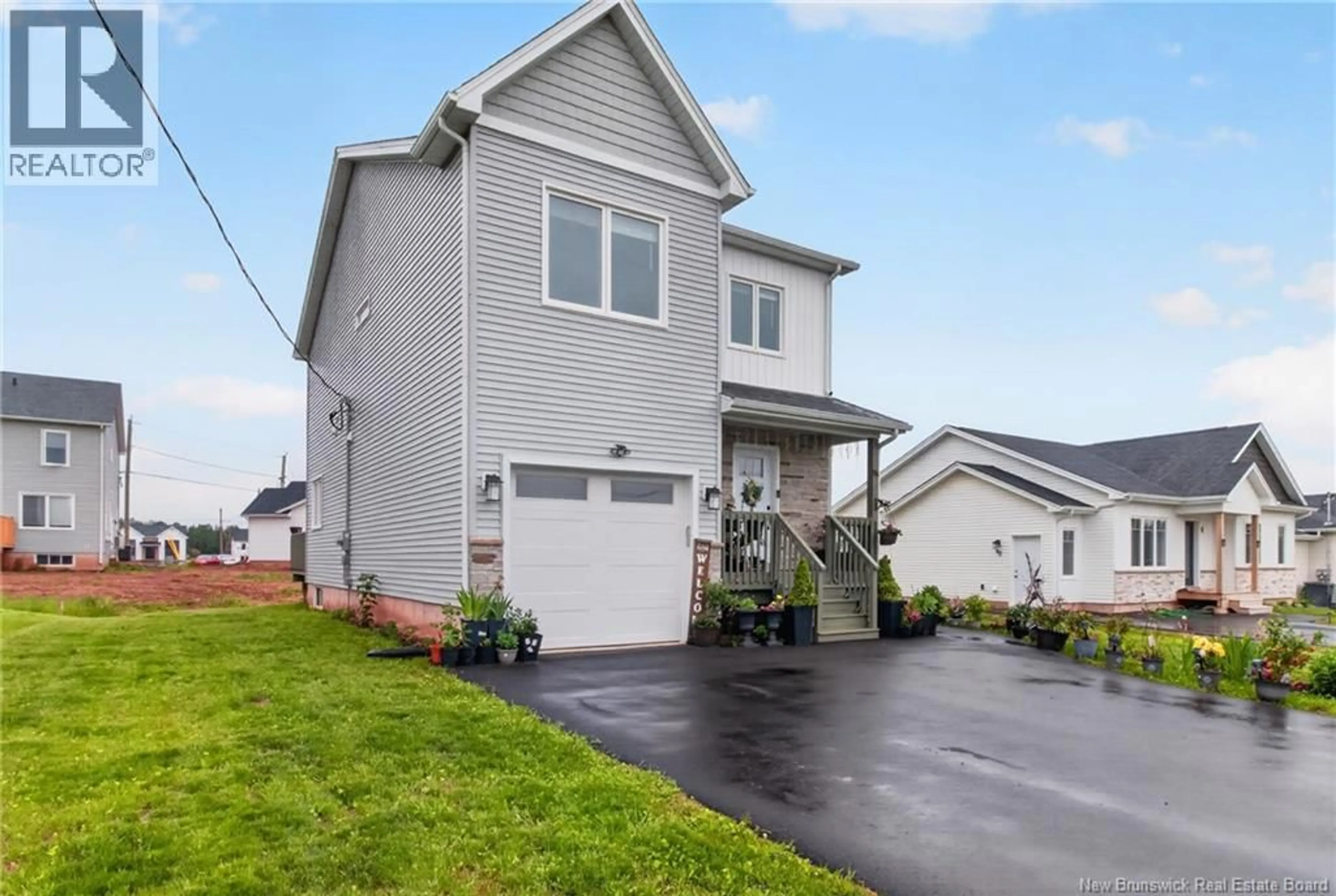 Home with vinyl exterior material, street for 88 MACINTOSH BOULEVARD, Moncton New Brunswick E1K0A1
