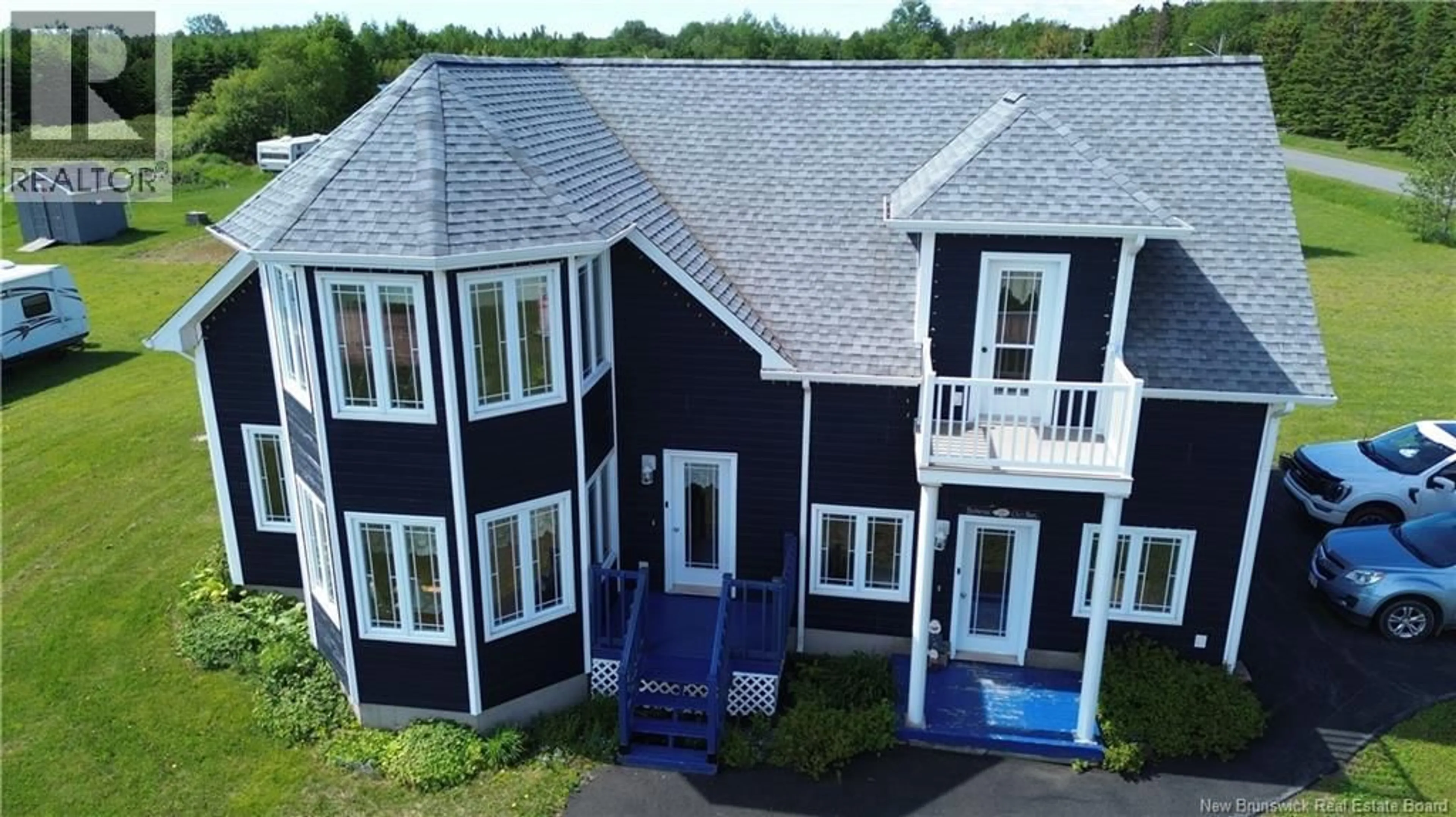 A pic from outside/outdoor area/front of a property/back of a property/a pic from drone, building for 78 RUE DES CHAMPS, Pointe-Verte New Brunswick E8J2V4