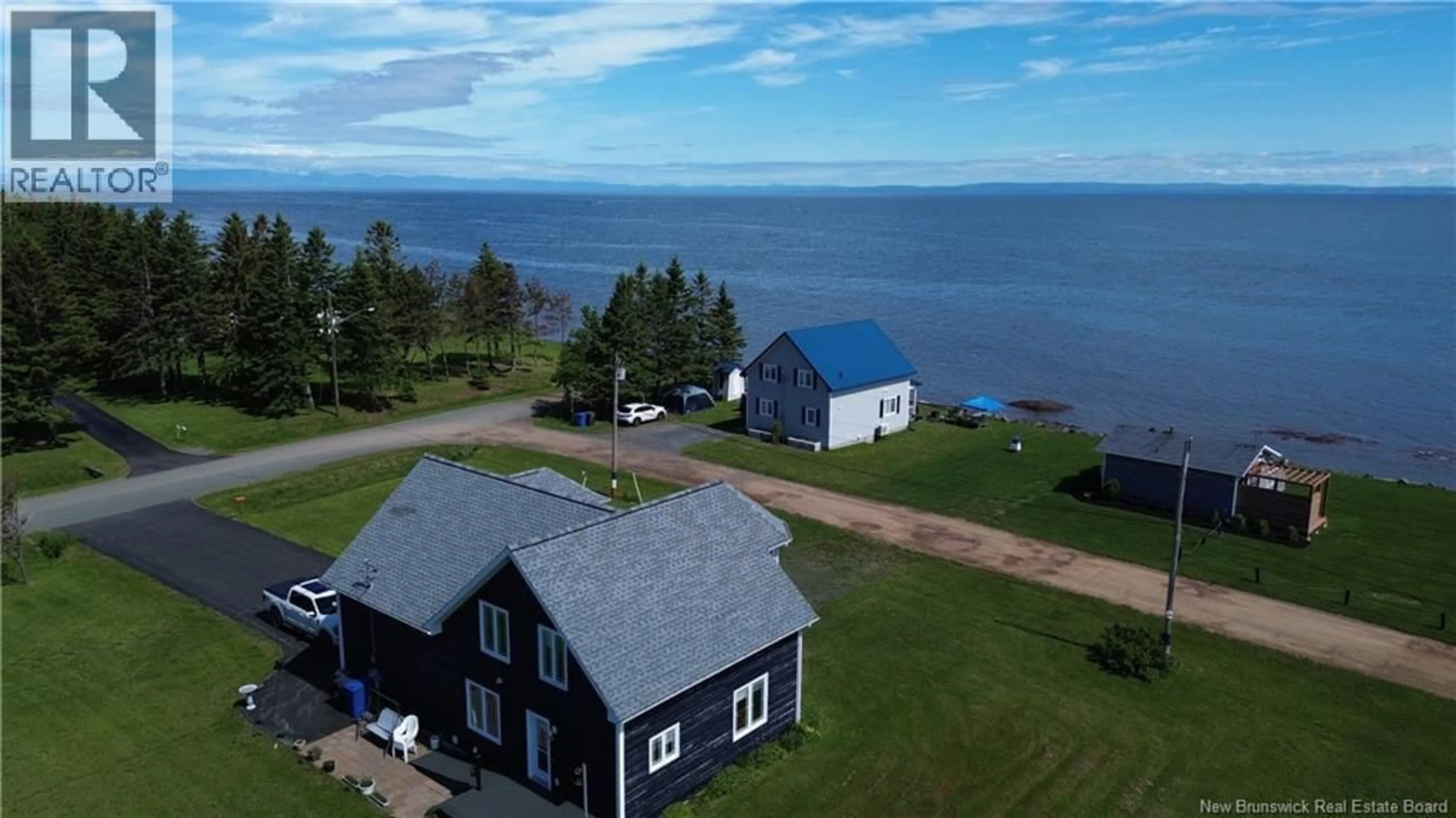 A pic from outside/outdoor area/front of a property/back of a property/a pic from drone, water/lake/river/ocean view for 78 RUE DES CHAMPS, Pointe-Verte New Brunswick E8J2V4