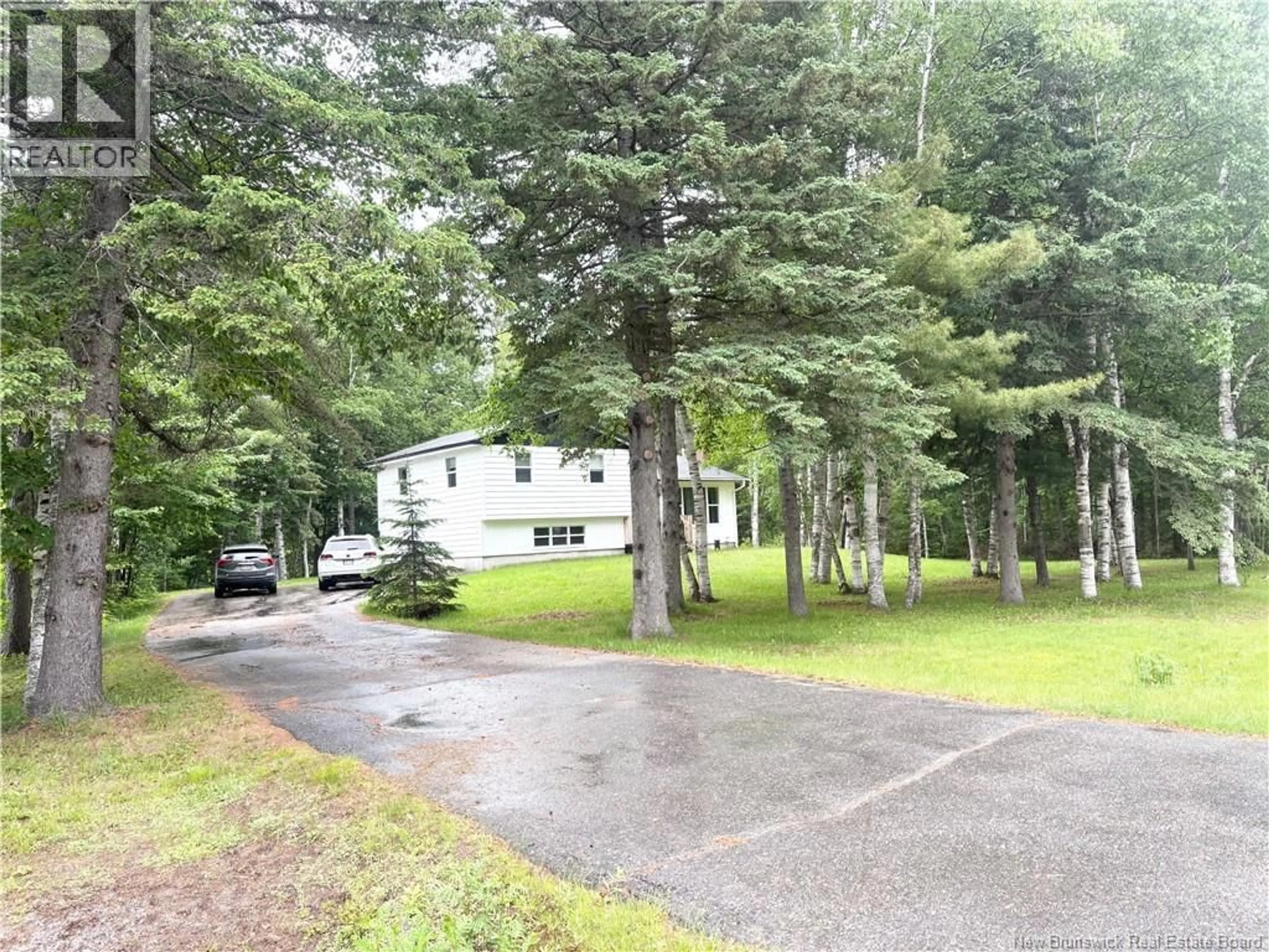 A pic from outside/outdoor area/front of a property/back of a property/a pic from drone, forest/trees view for 3 HONEY STREET, Chatham New Brunswick E1N3R7