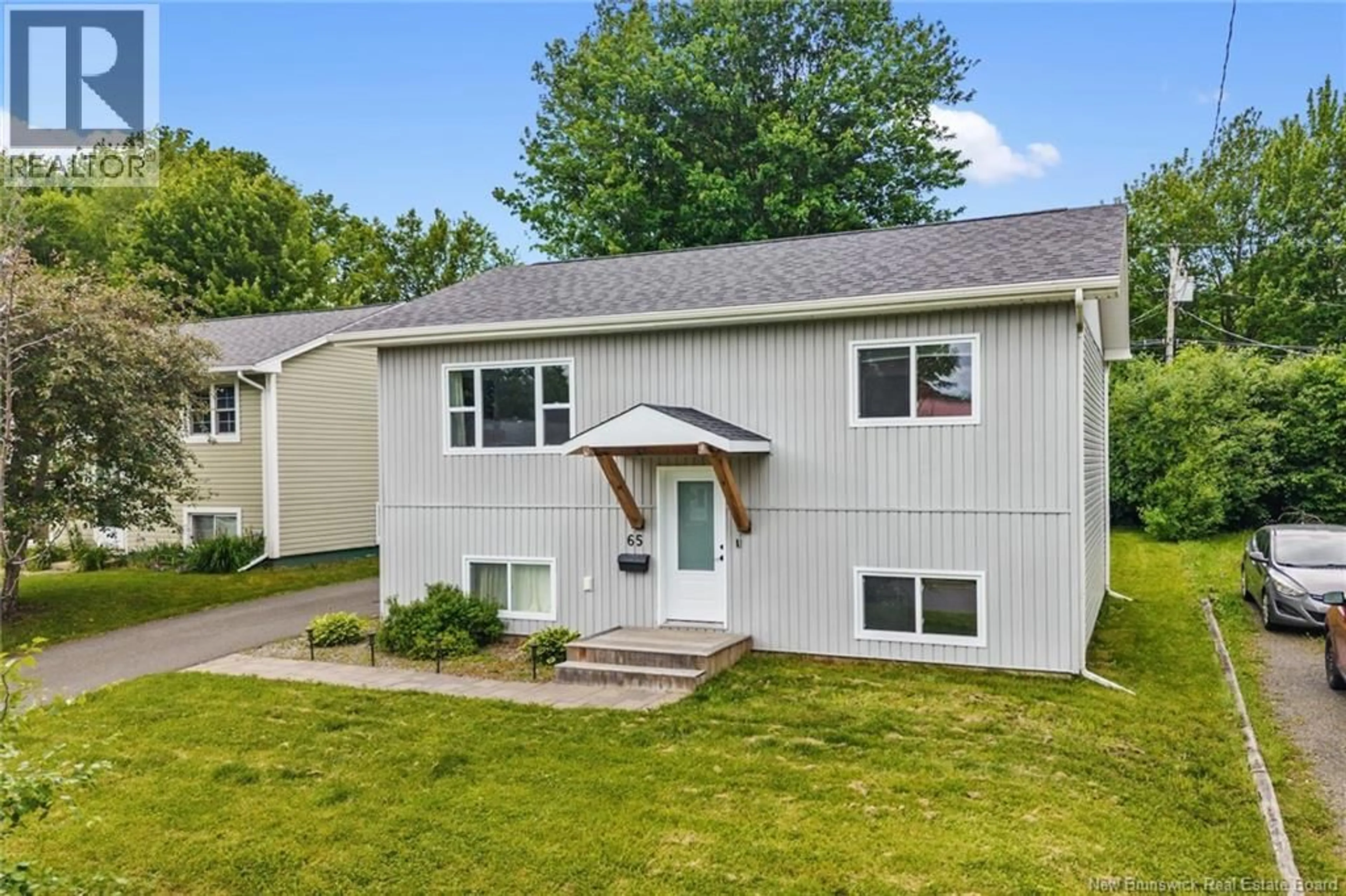 Home with vinyl exterior material, street for 65 HAZEN COURT, Fredericton New Brunswick E3B5K9