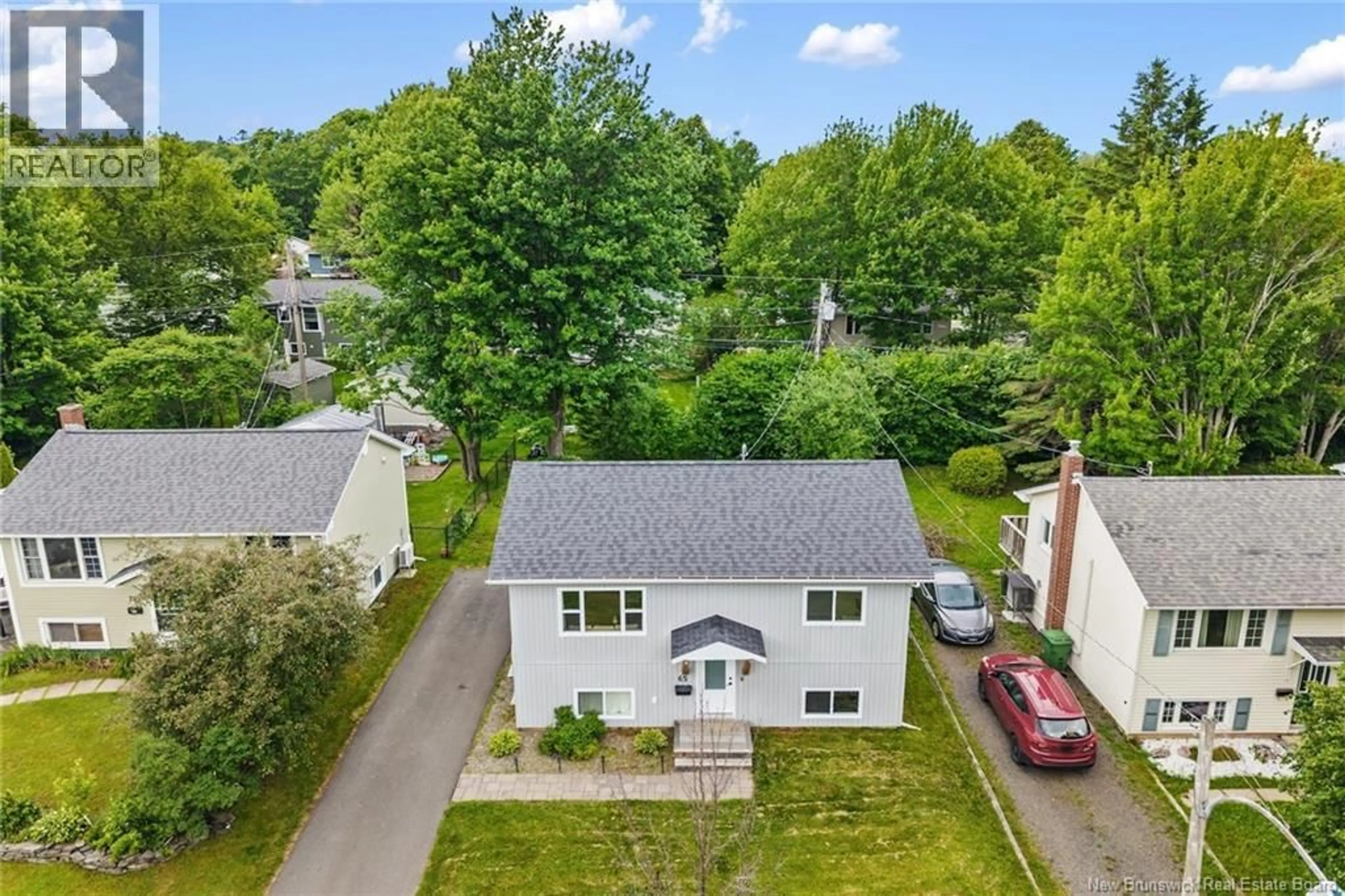 A pic from outside/outdoor area/front of a property/back of a property/a pic from drone, street for 65 HAZEN COURT, Fredericton New Brunswick E3B5K9