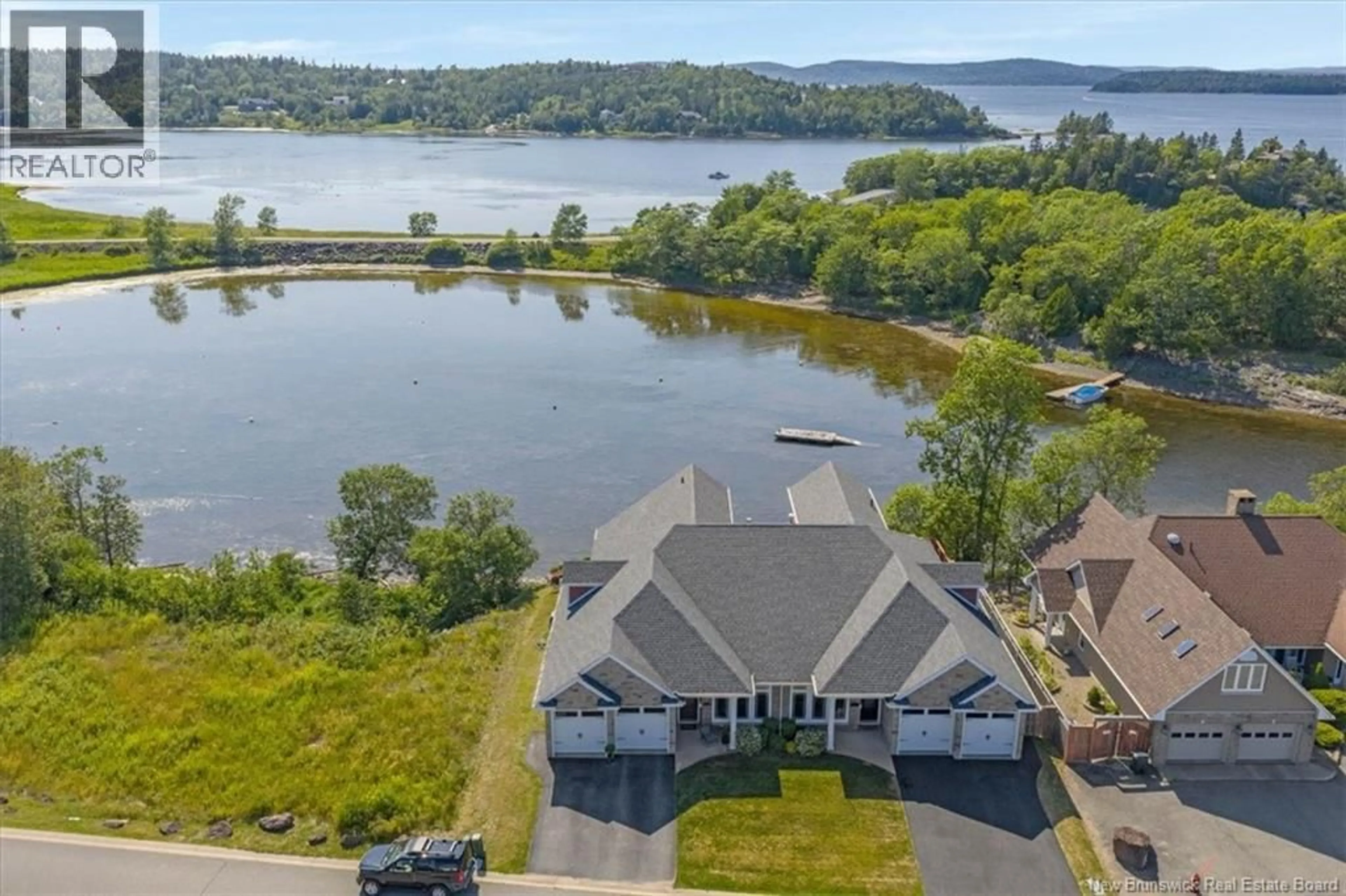 A pic from outside/outdoor area/front of a property/back of a property/a pic from drone, water/lake/river/ocean view for 41 YACHT HAVEN LANE, Saint John New Brunswick E2K5N8