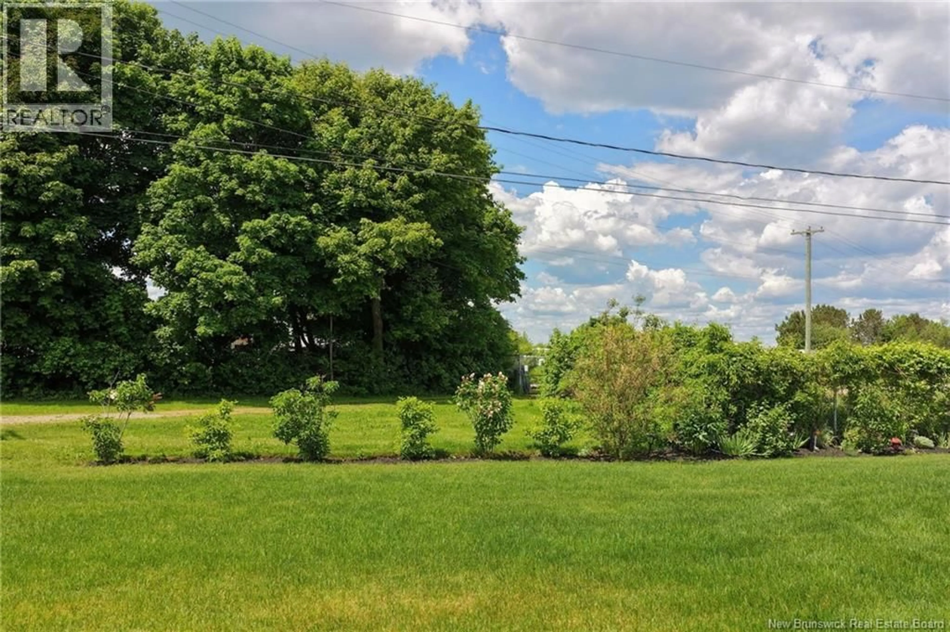 A pic from outside/outdoor area/front of a property/back of a property/a pic from drone, forest/trees view for 104 - 724 ROUTE 133, Pointe-Du-Chêne New Brunswick E4P5A3