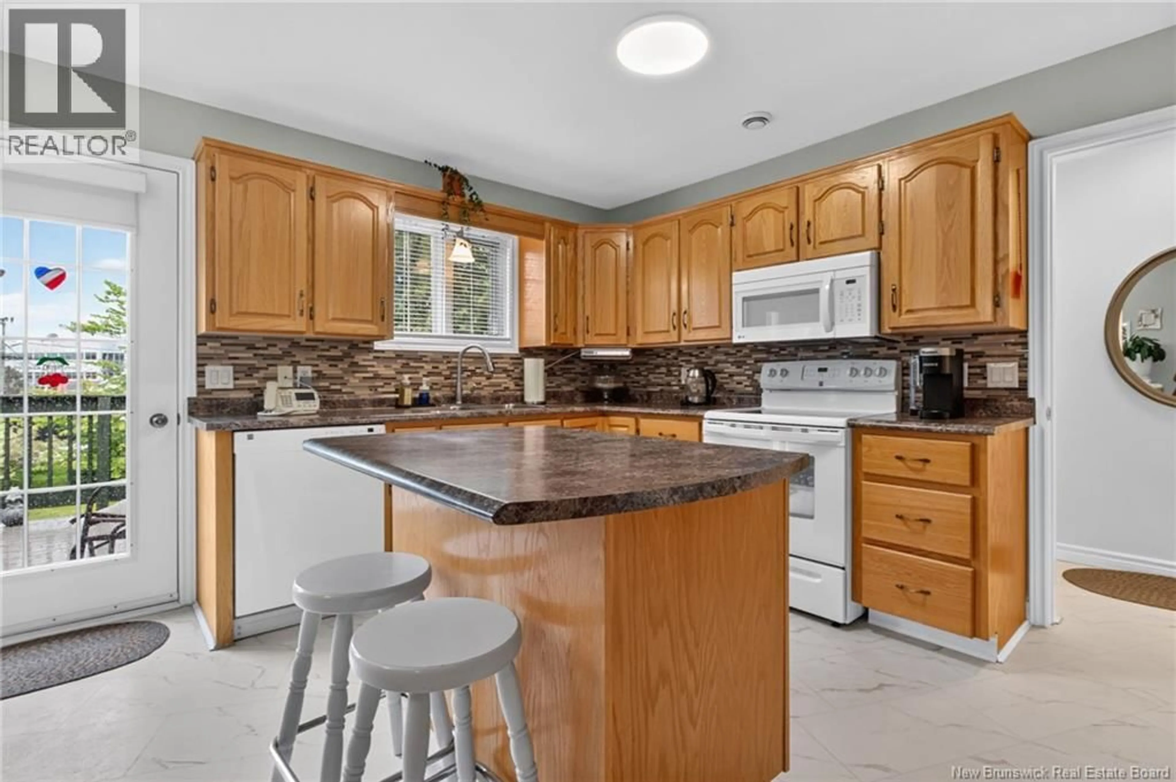 Open concept kitchen, ceramic/tile floor for 188 OLIVIER STREET, Dieppe New Brunswick E1A1S6
