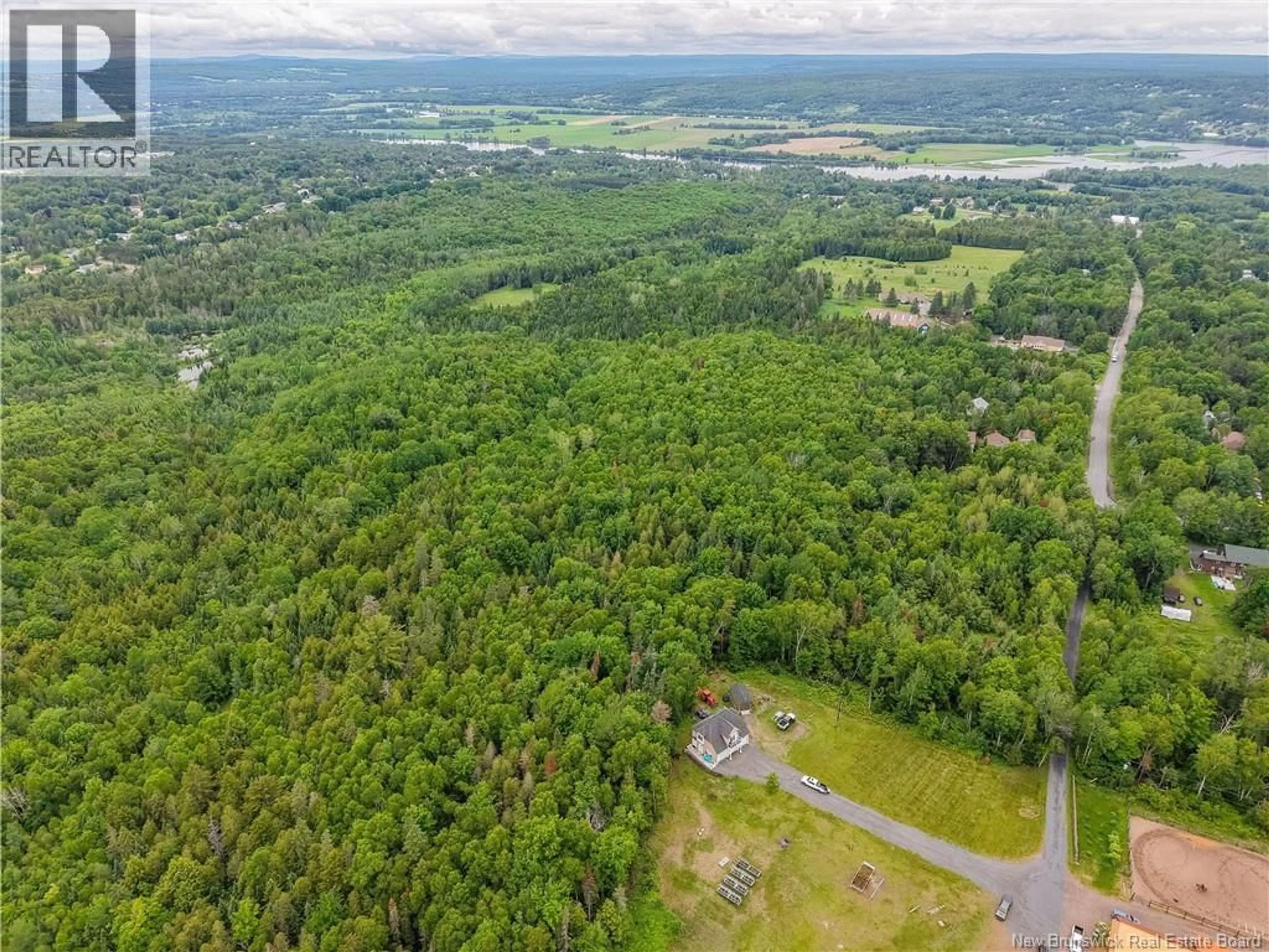 A pic from outside/outdoor area/front of a property/back of a property/a pic from drone, forest/trees view for 81 MARY ELLEN DRIVE, Fredericton New Brunswick E3E2G4