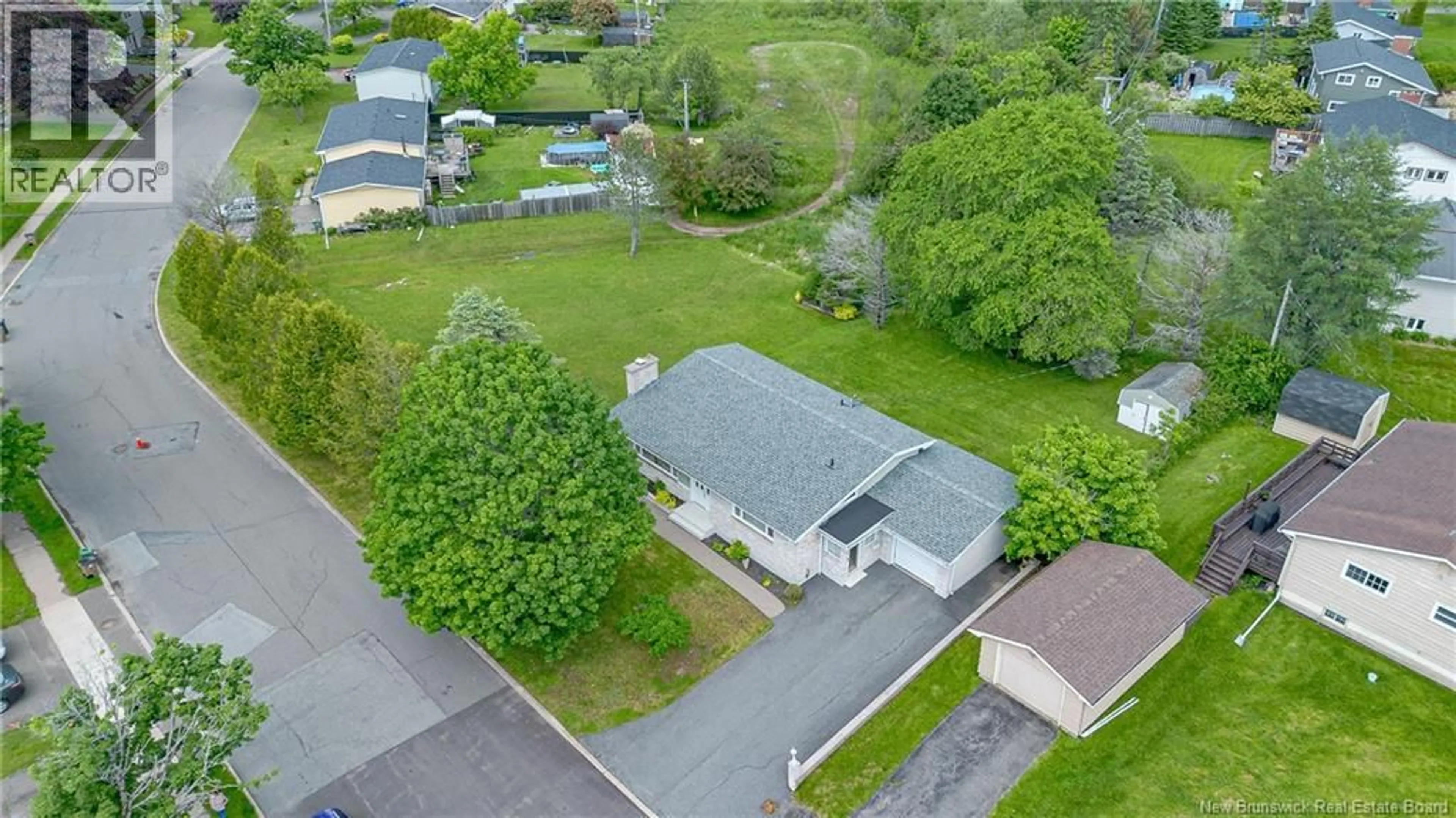 A pic from outside/outdoor area/front of a property/back of a property/a pic from drone, street for 92 GREENDALE CRESCENT, Saint John New Brunswick E2M4L6