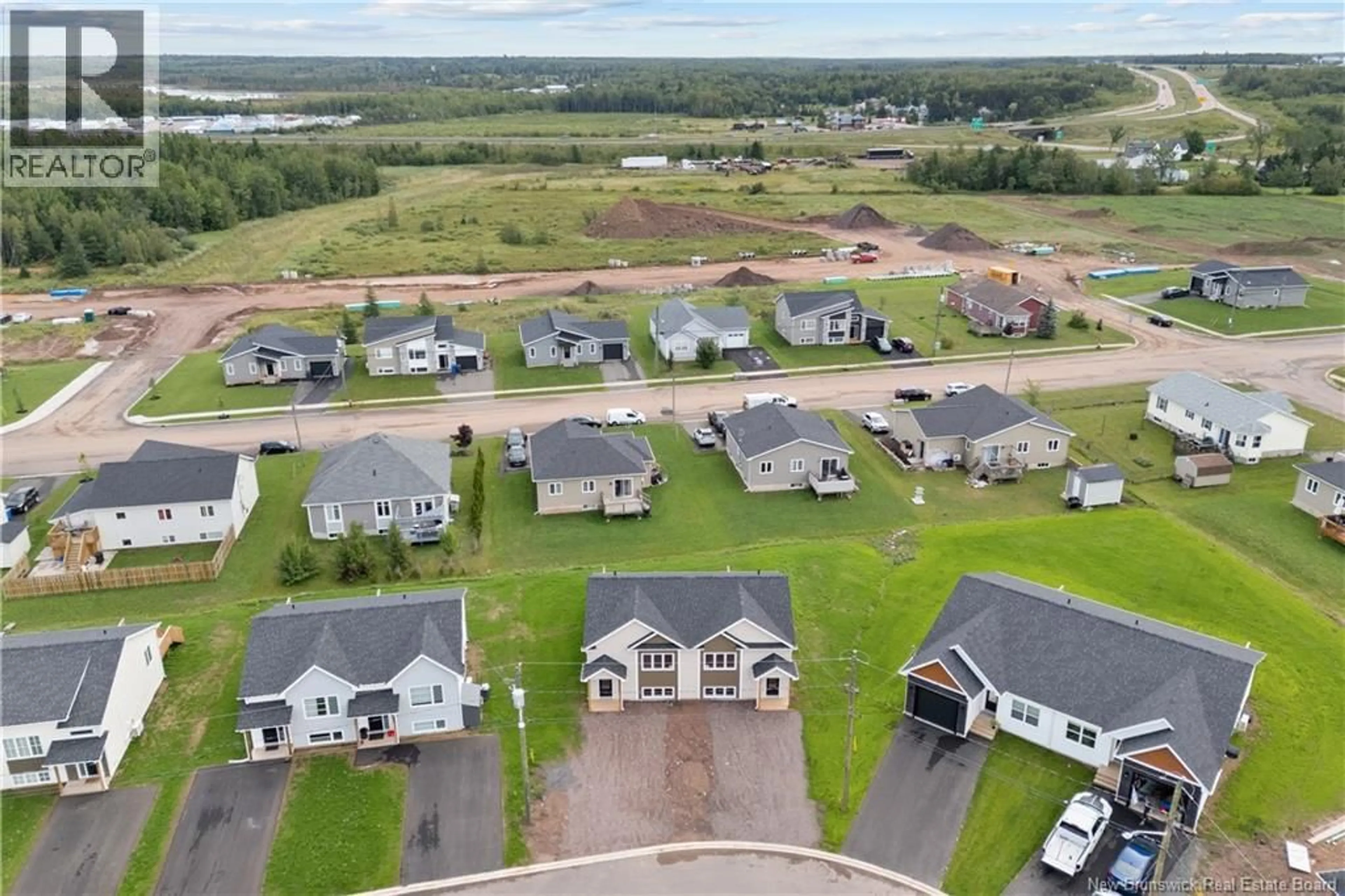 A pic from outside/outdoor area/front of a property/back of a property/a pic from drone, unknown for 37 ALOSIER CRESCENT, Moncton New Brunswick E1K0A1