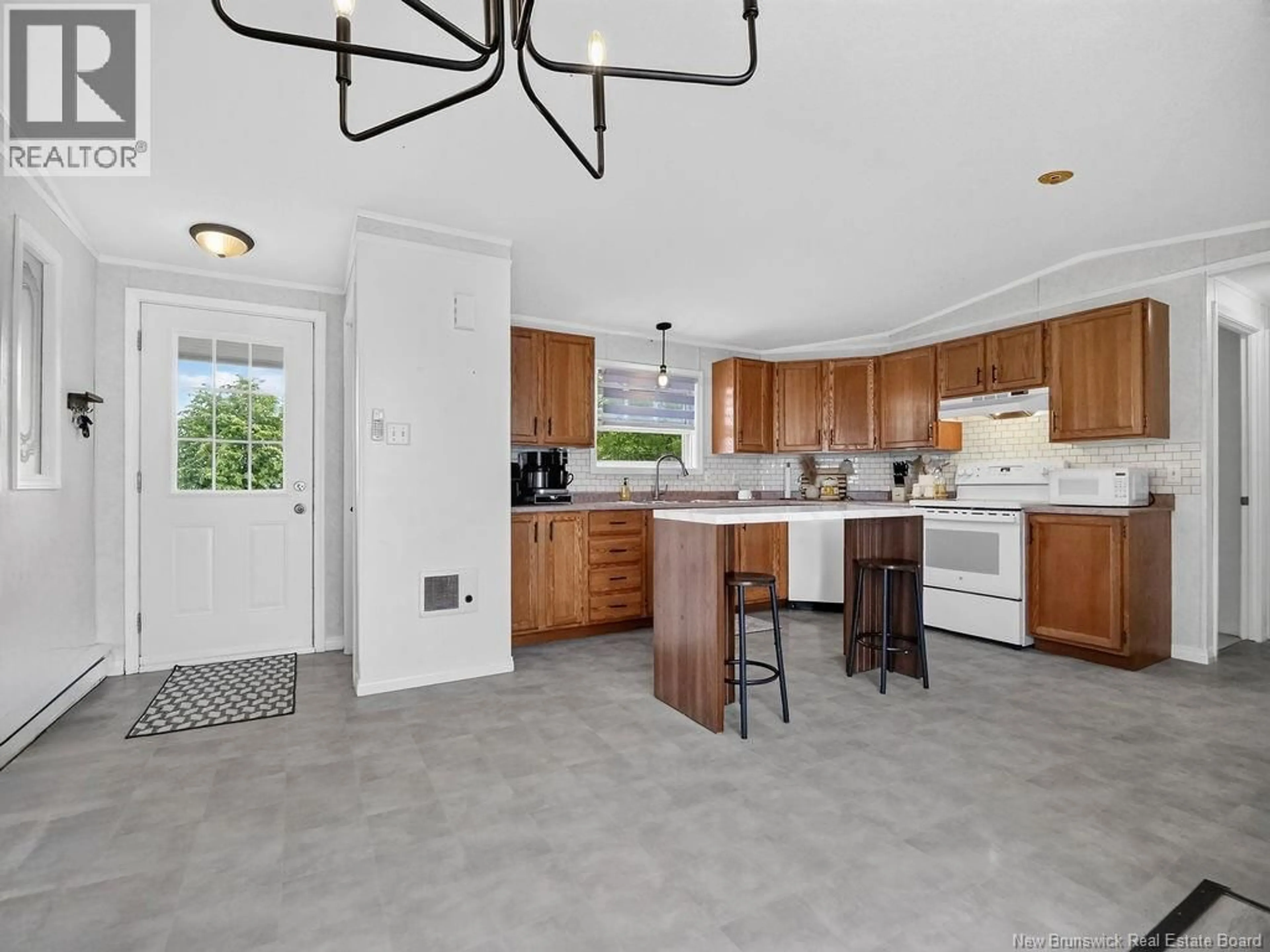 Open concept kitchen, ceramic/tile floor for 1 PERIDOT, Moncton New Brunswick E1H3E4