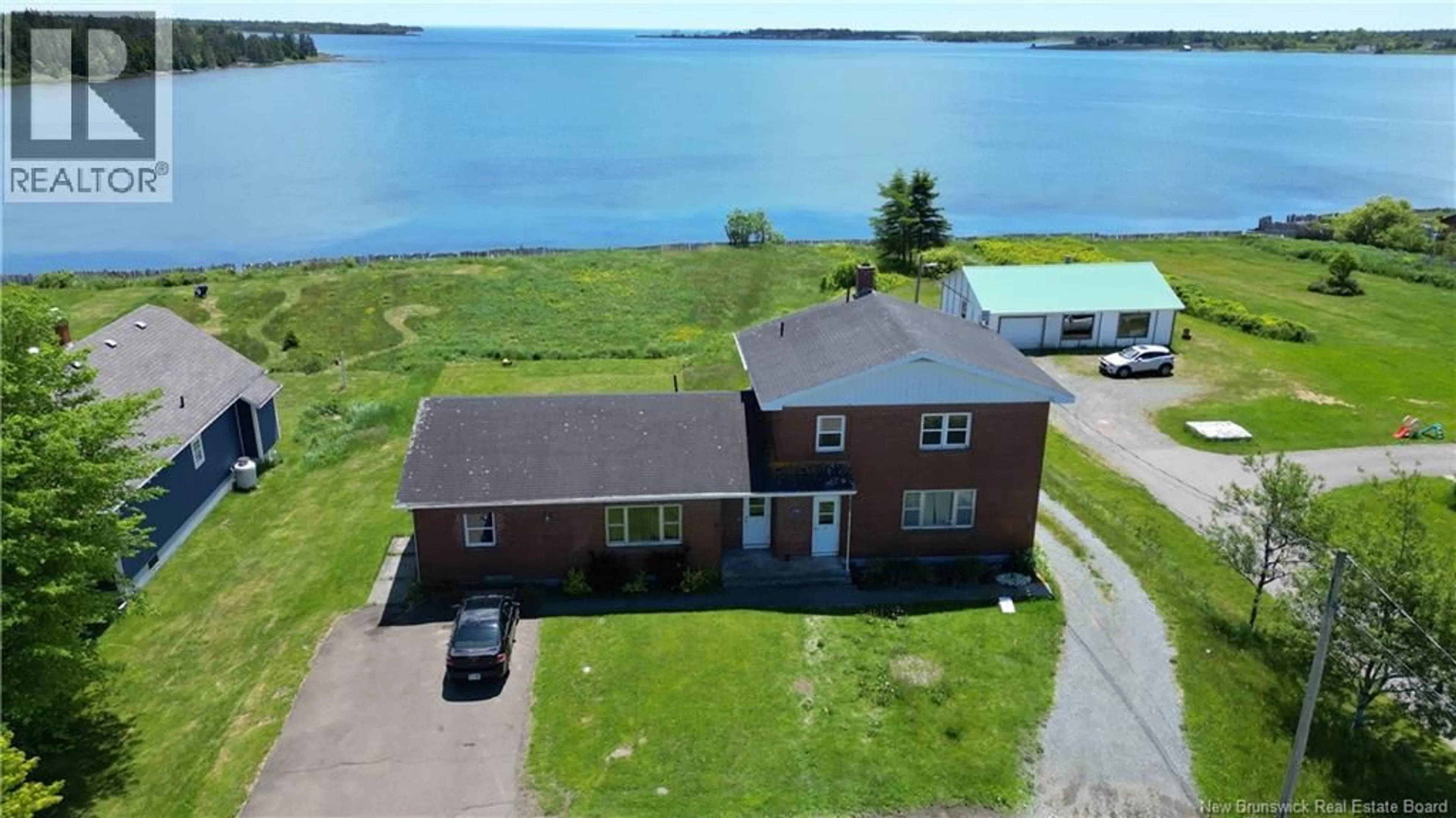A pic from outside/outdoor area/front of a property/back of a property/a pic from drone, water/lake/river/ocean view for 1101 ROUTE 776, Grand Manan New Brunswick E5G4E5