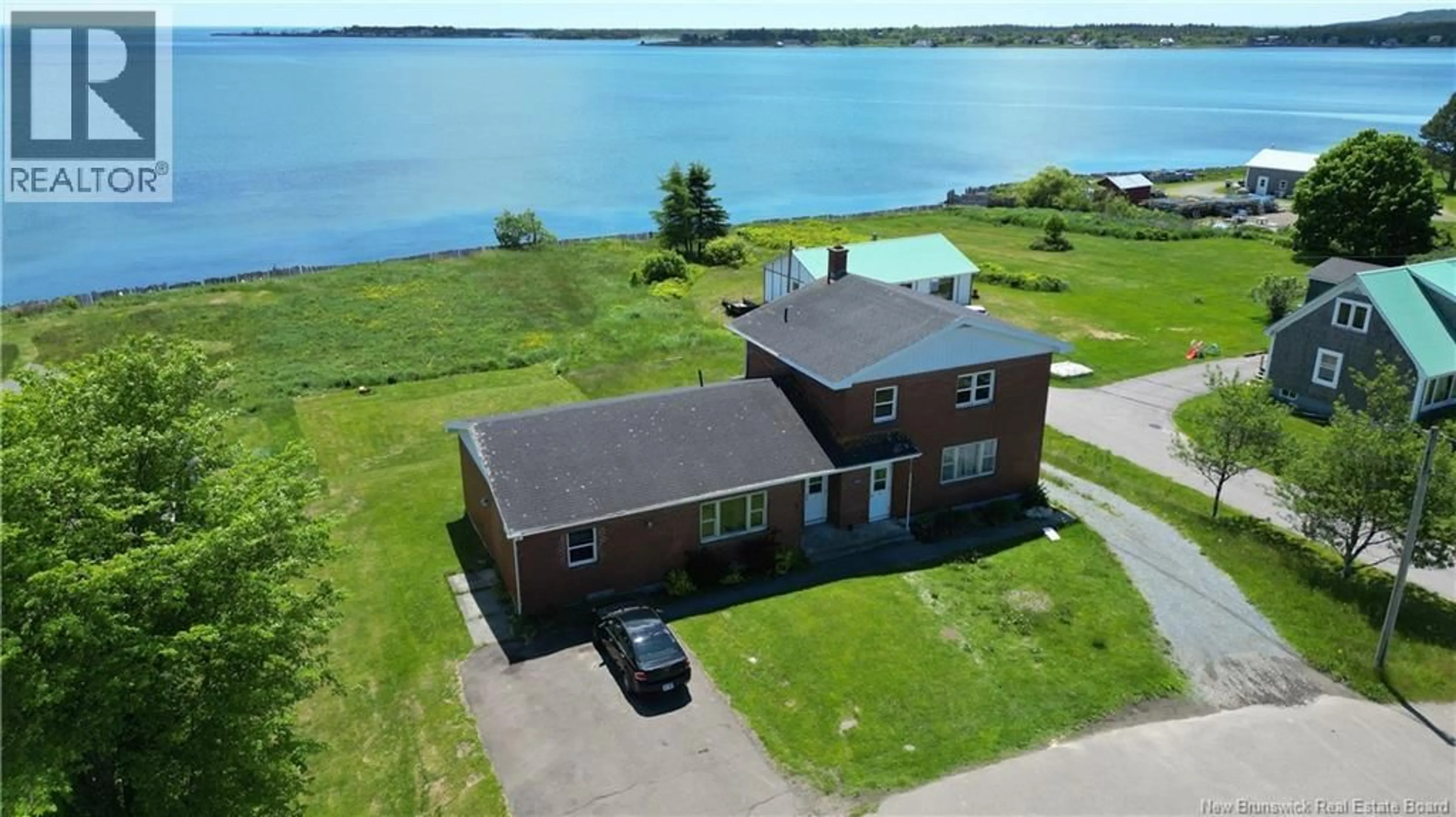 A pic from outside/outdoor area/front of a property/back of a property/a pic from drone, water/lake/river/ocean view for 1101 ROUTE 776, Grand Manan New Brunswick E5G4E5