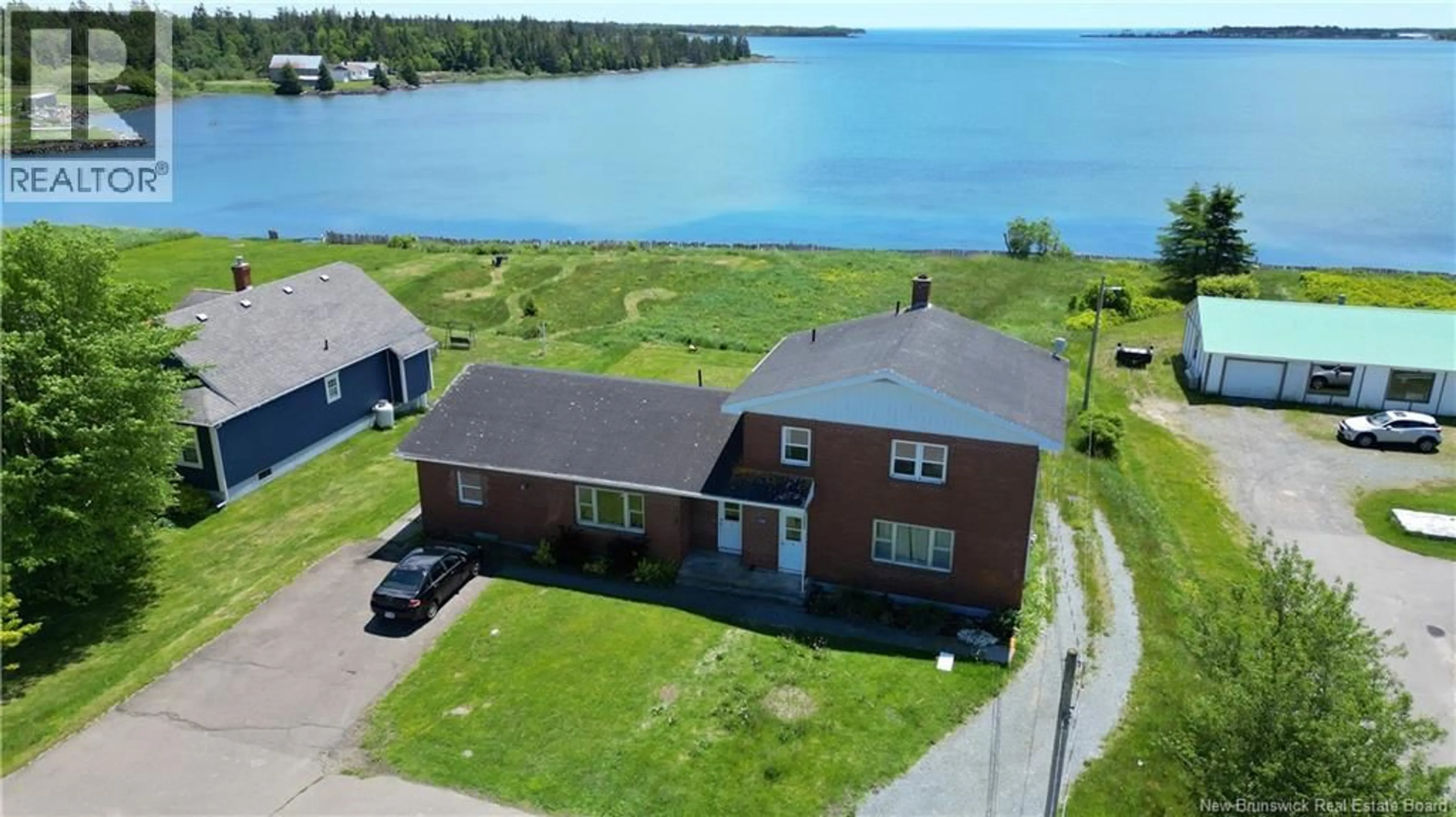 A pic from outside/outdoor area/front of a property/back of a property/a pic from drone, water/lake/river/ocean view for 1101 ROUTE 776, Grand Manan New Brunswick E5G4E5