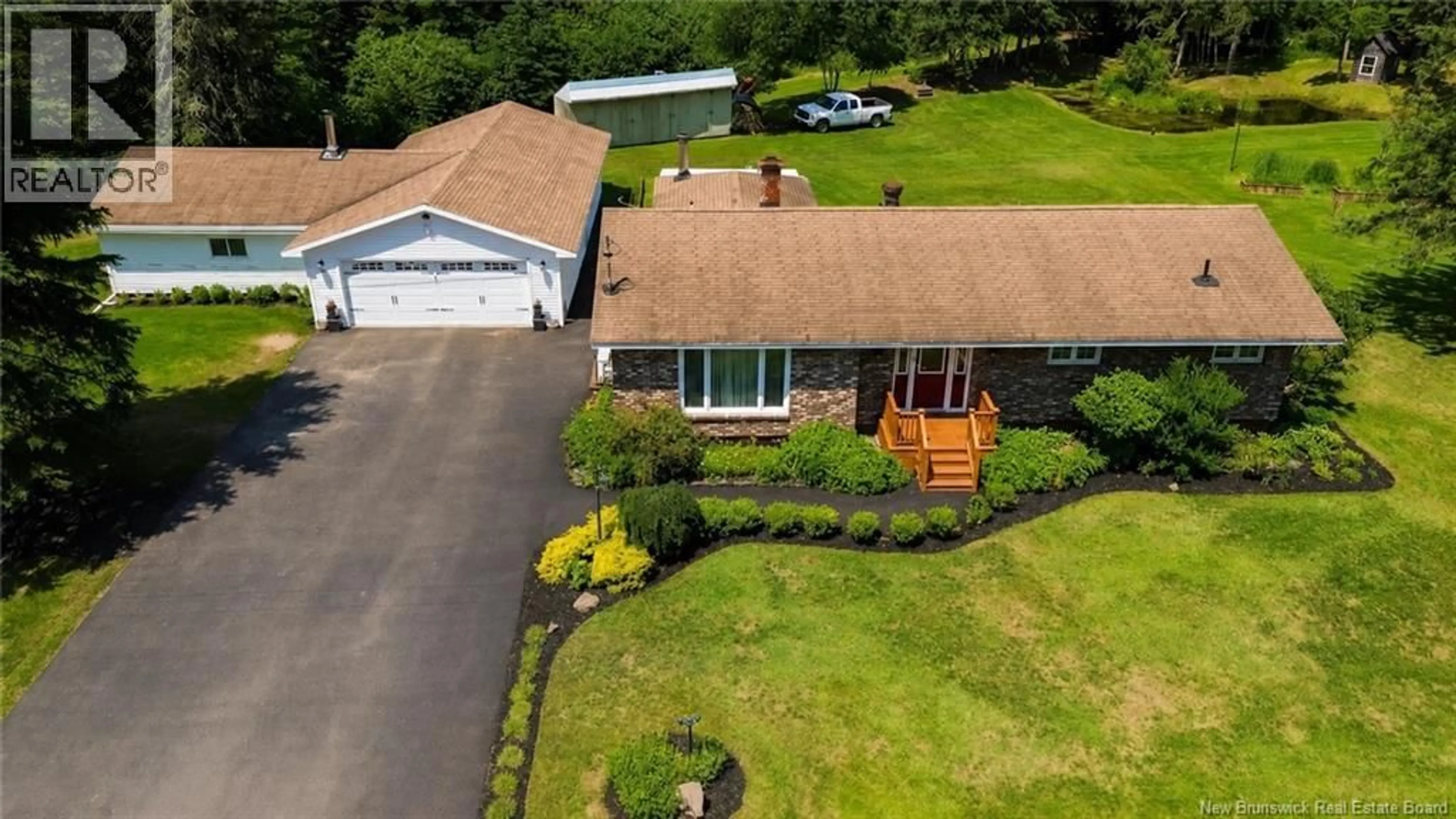 A pic from outside/outdoor area/front of a property/back of a property/a pic from drone, unknown for 109 BELLEISLE ROAD, Norton New Brunswick E5T1S7