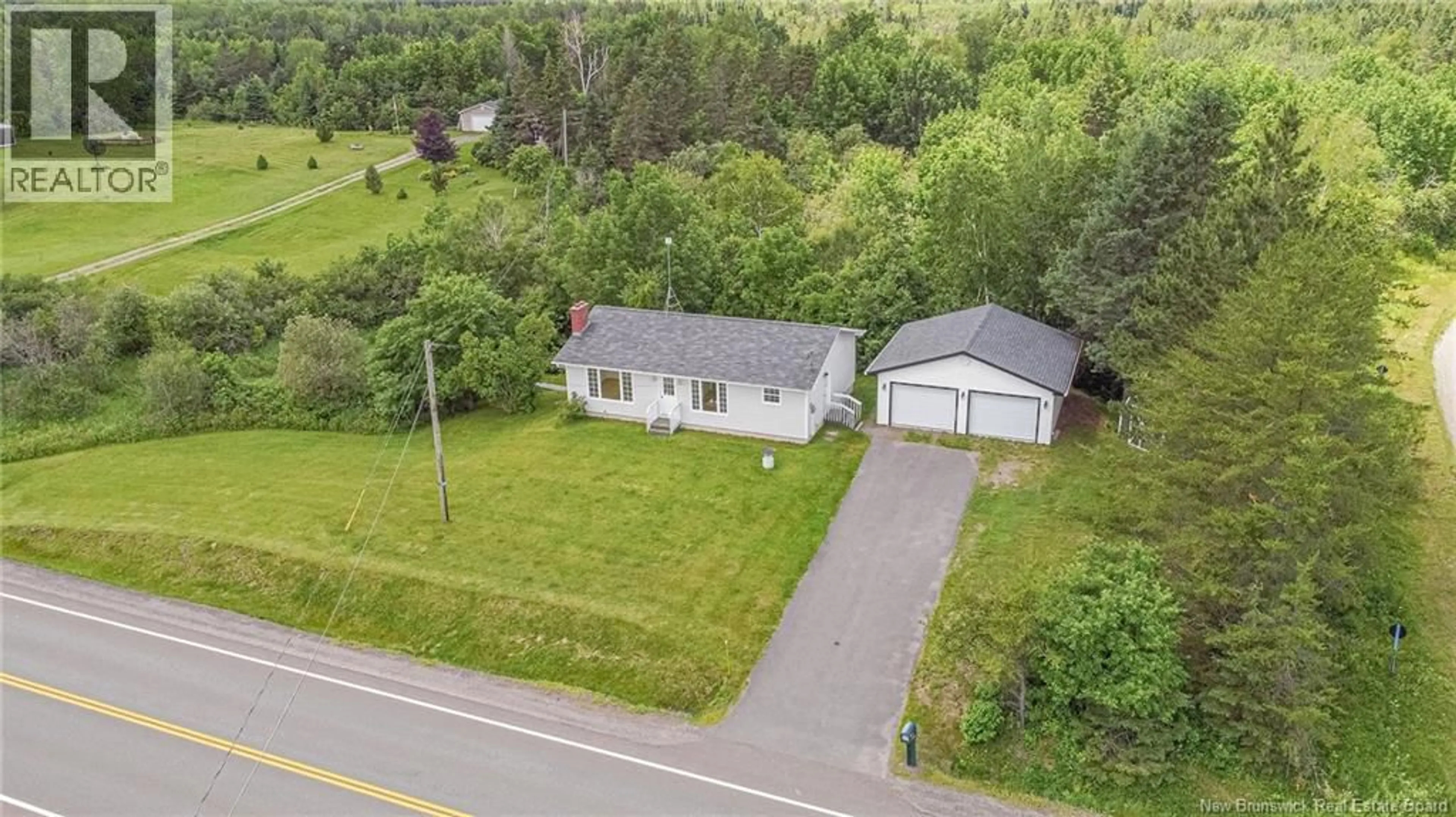 A pic from outside/outdoor area/front of a property/back of a property/a pic from drone, street for 160 ROUTE 3, New Market New Brunswick E6K2W2