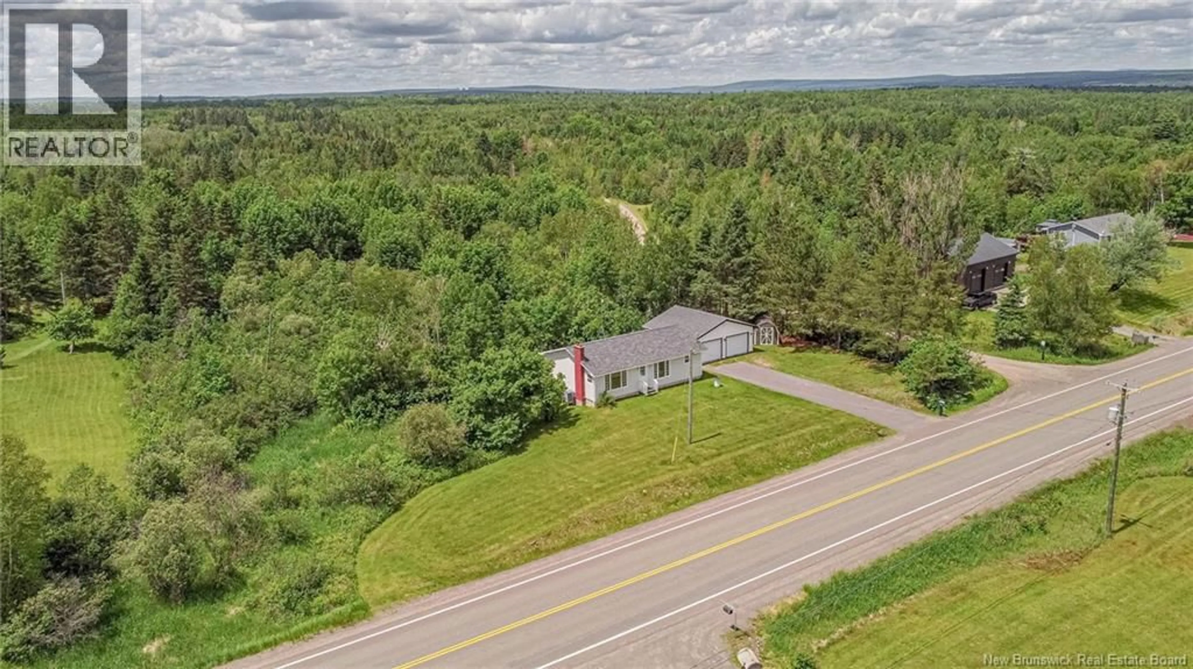 A pic from outside/outdoor area/front of a property/back of a property/a pic from drone, unknown for 160 ROUTE 3, New Market New Brunswick E6K2W2