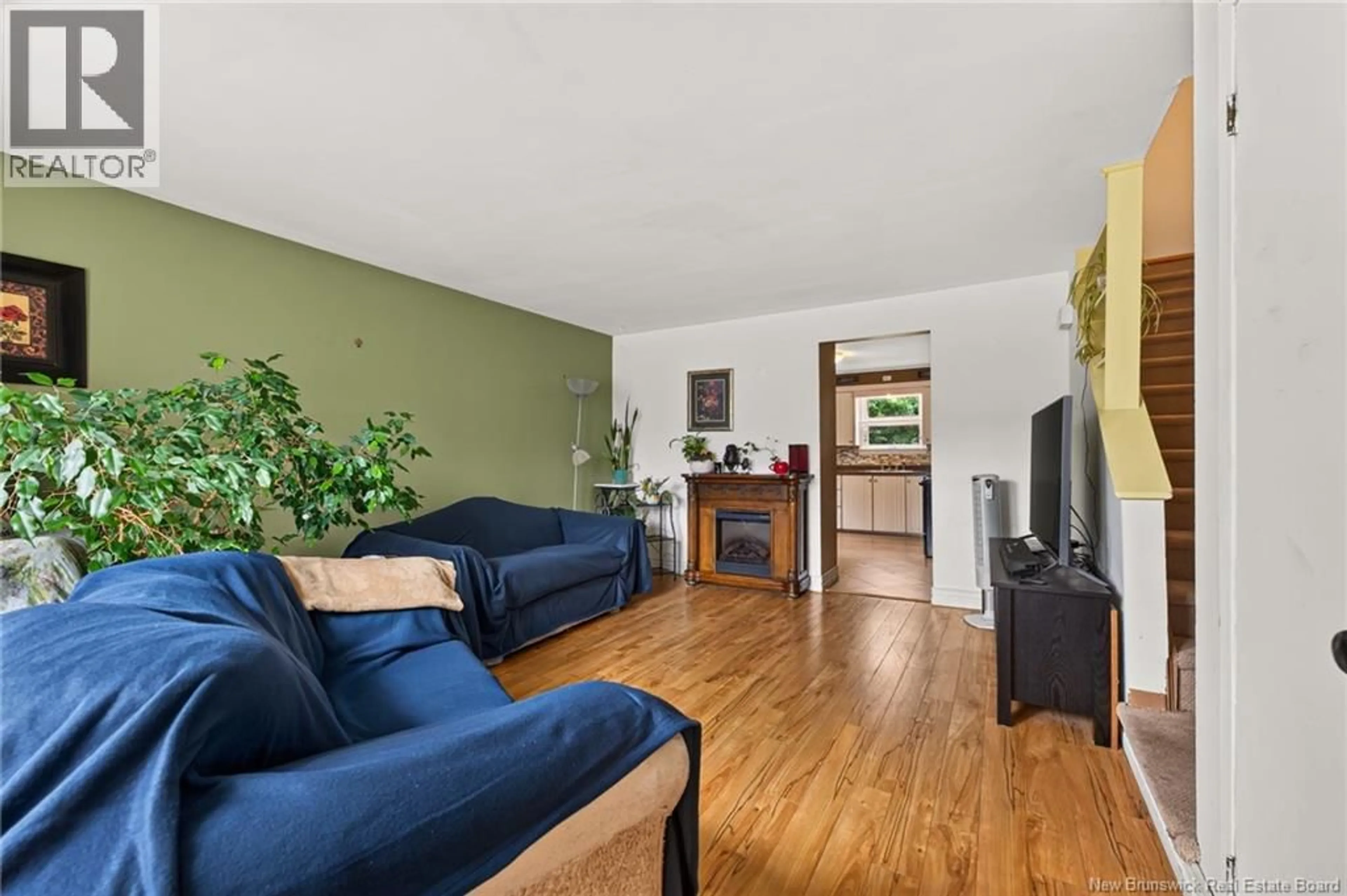 Living room with furniture, wood/laminate floor for 45-47 WHITNEY AVENUE, Moncton New Brunswick E1C8C5