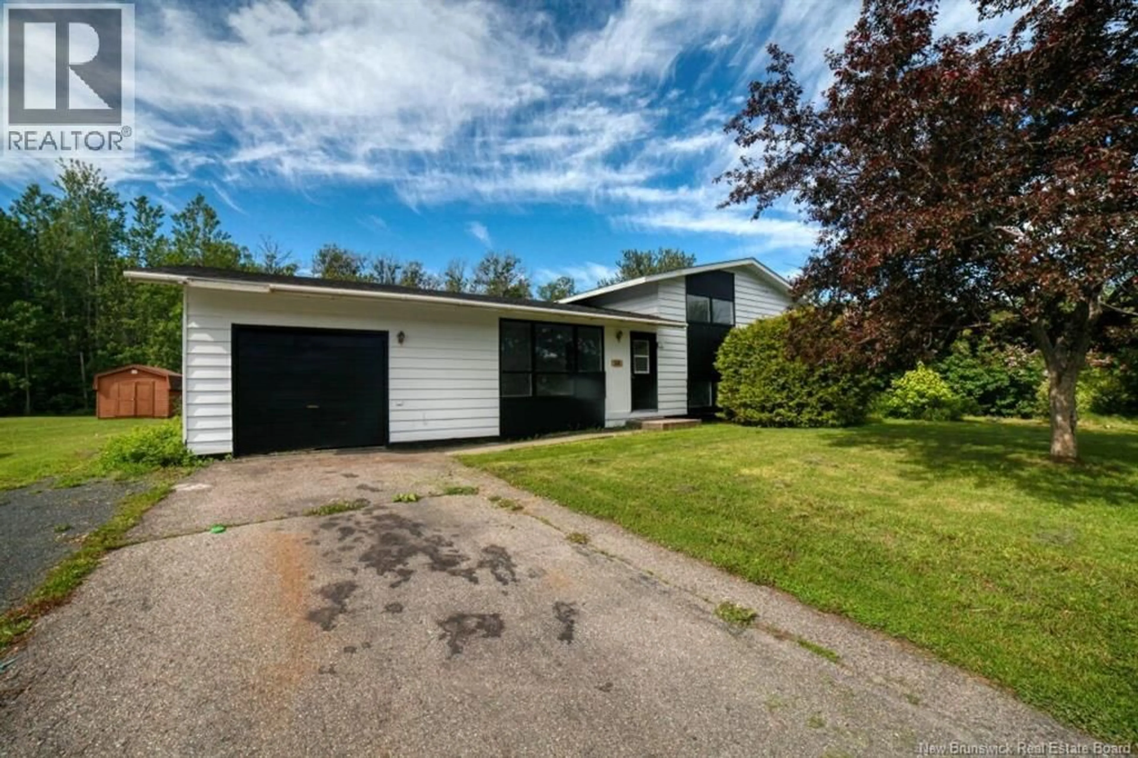 A pic from outside/outdoor area/front of a property/back of a property/a pic from drone, street for 58 CHALEUR, Belledune New Brunswick E8G1Z4