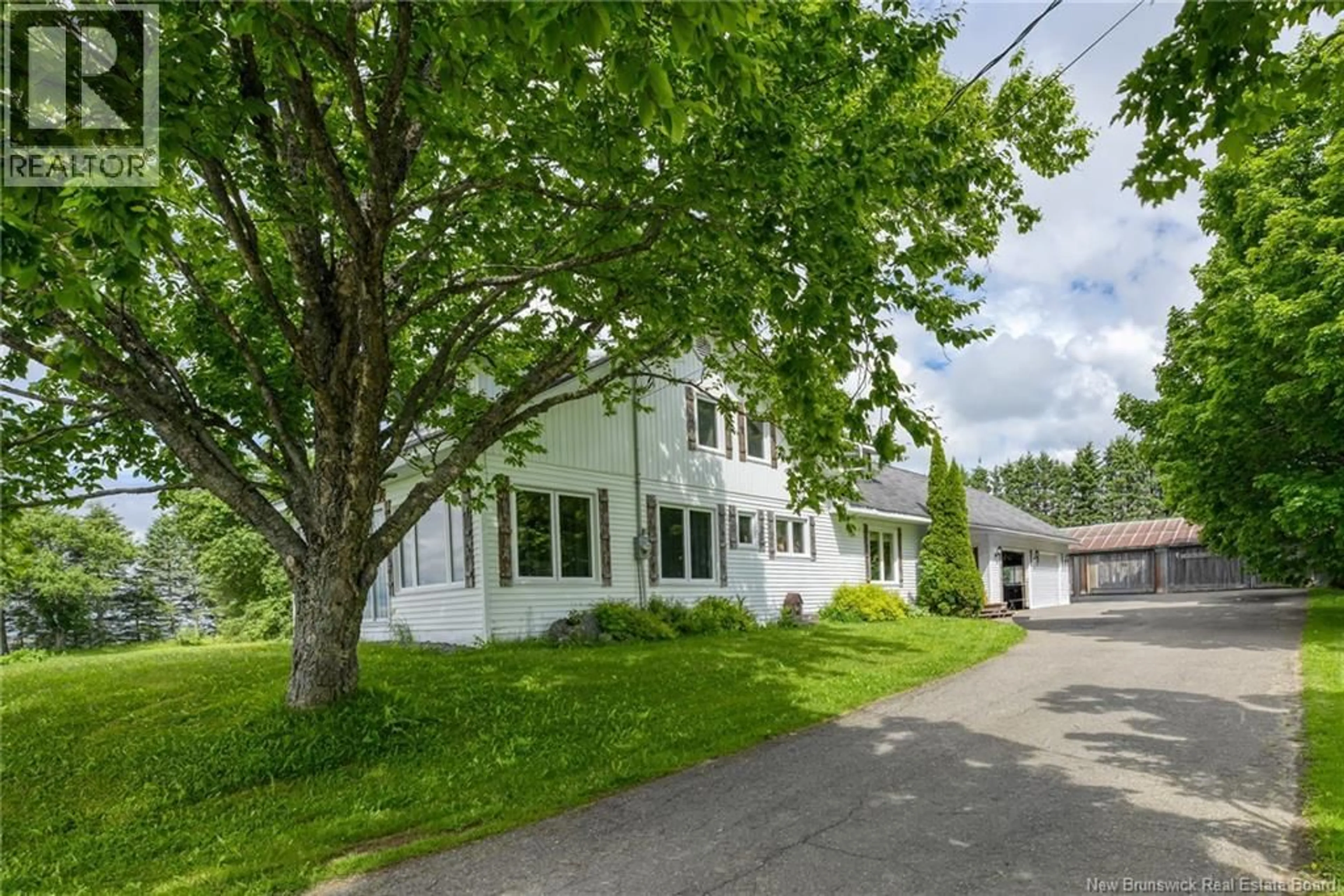 A pic from outside/outdoor area/front of a property/back of a property/a pic from drone, street for 9 MAZEROLLE, Saint-André New Brunswick E3Y3C8
