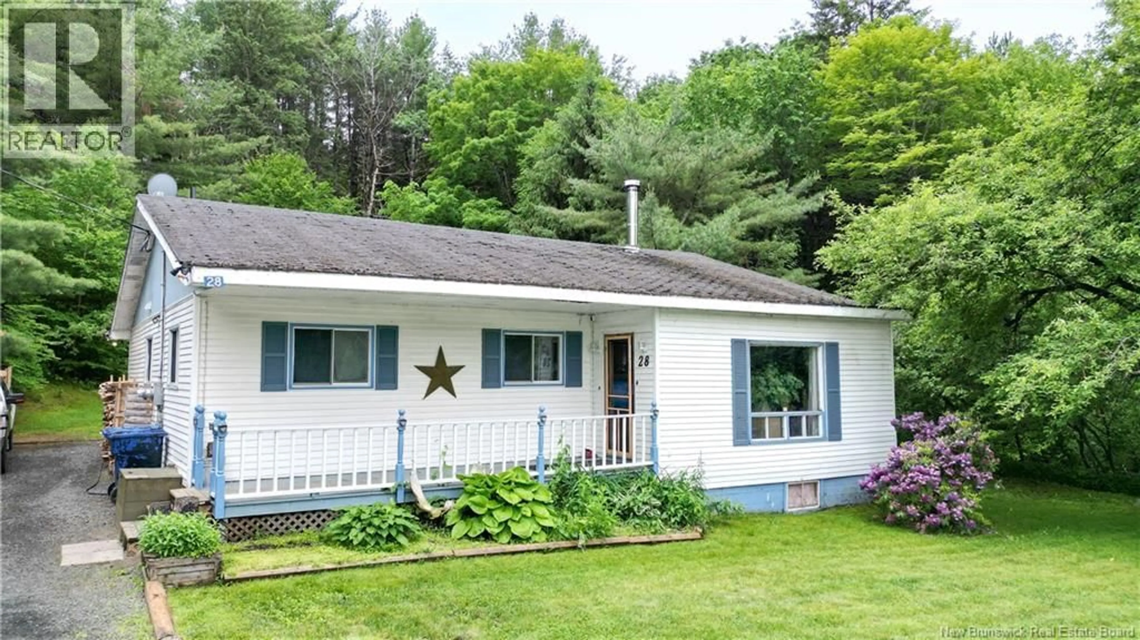 Home with vinyl exterior material, street for 28 MAIN STREET, Doaktown New Brunswick E9C1A2