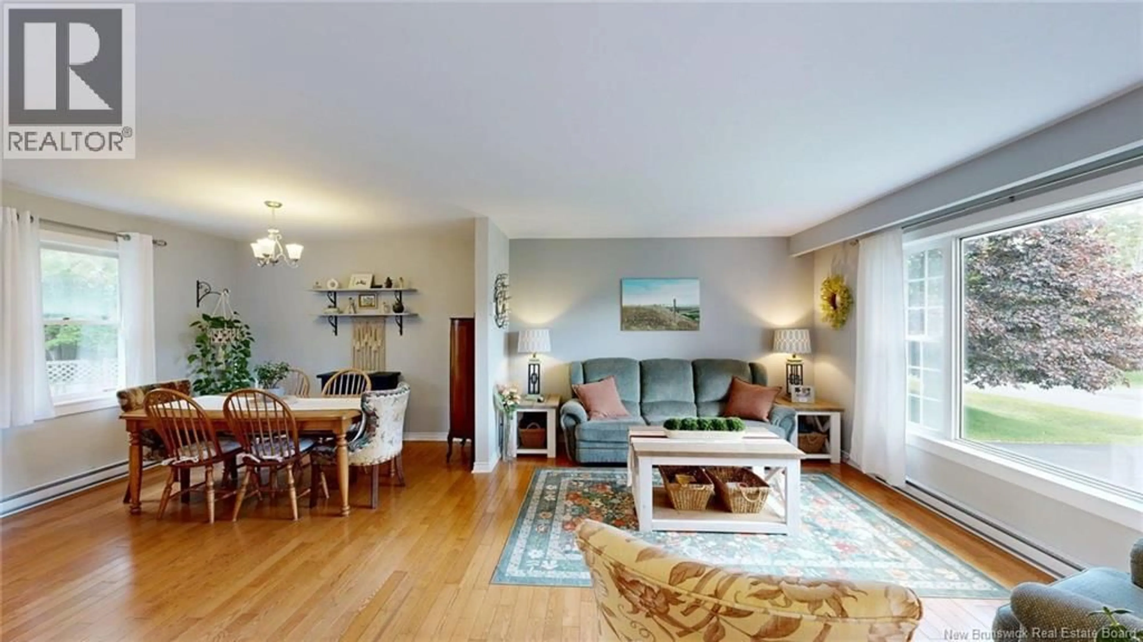 Living room with furniture, wood/laminate floor for 13 ELSIE DRIVE, Quispamsis New Brunswick E2E4R7