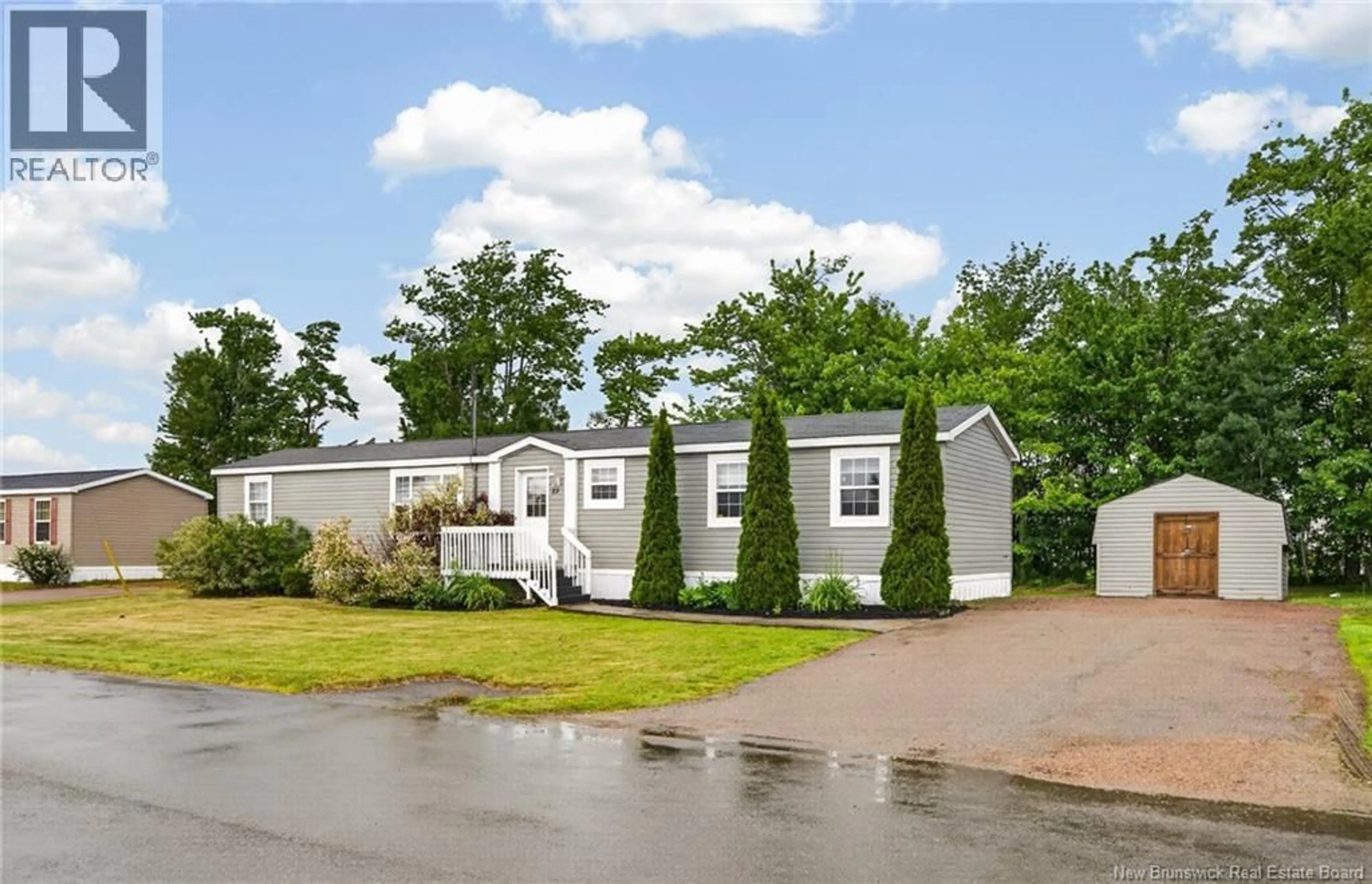 Home with vinyl exterior material, street for 82 TRACADIE, Dieppe New Brunswick E1A8P2