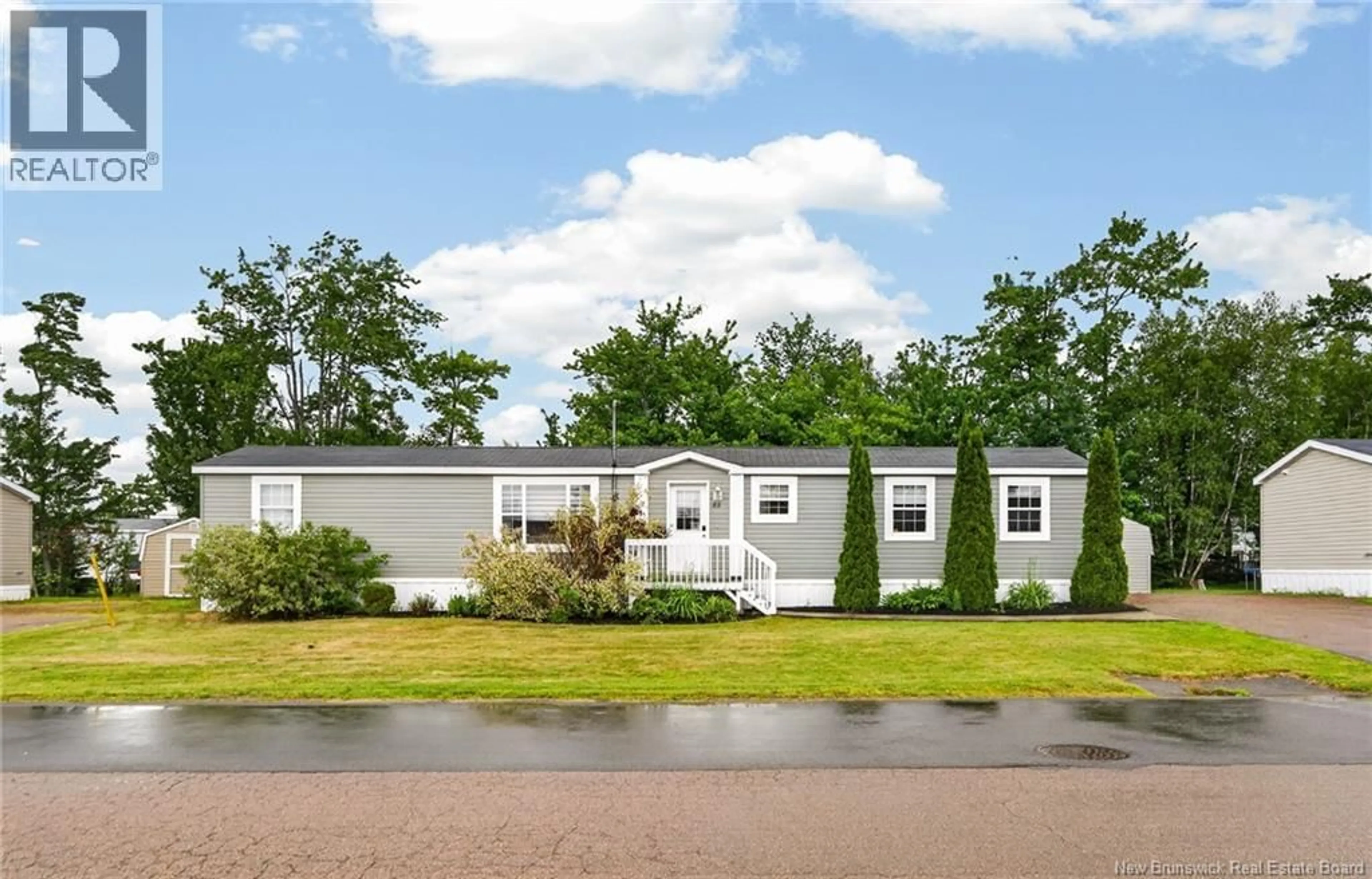 Home with vinyl exterior material, street for 82 TRACADIE, Dieppe New Brunswick E1A8P2